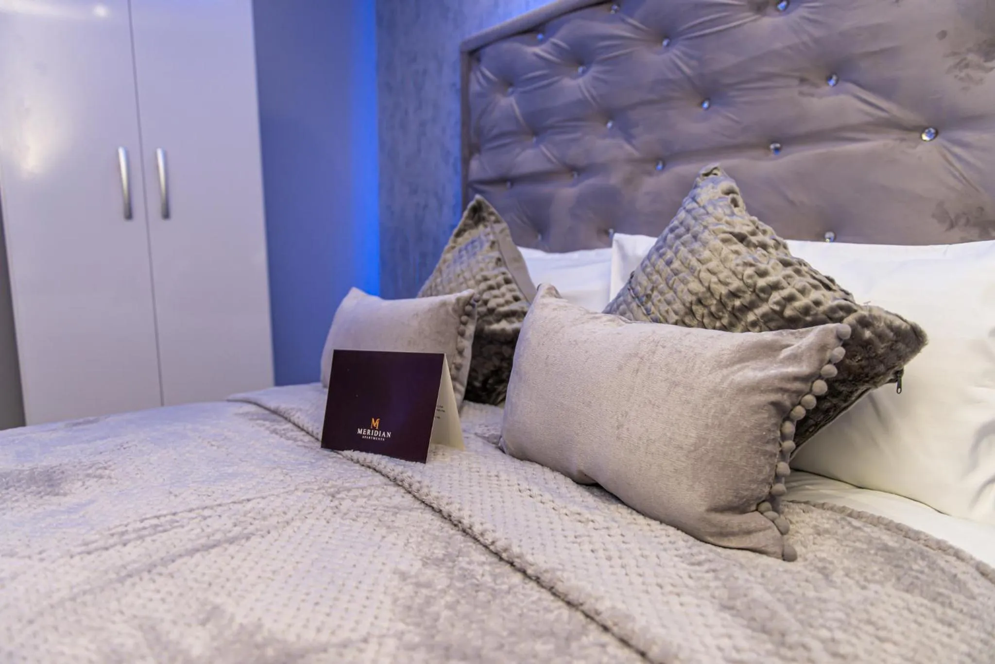 Bed in Meridian Serviced Apartments