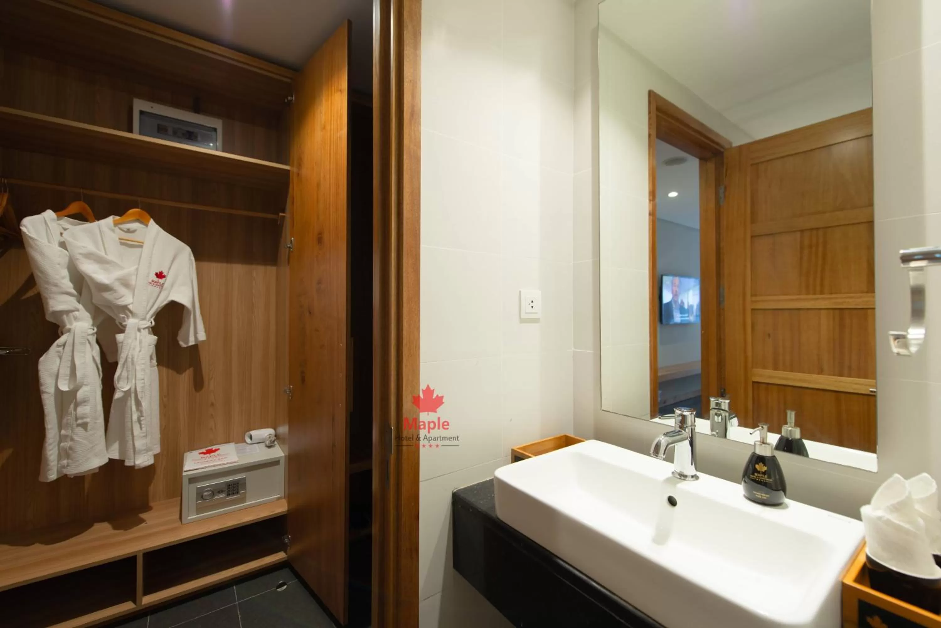 Toilet in Maple Hotel & Apartment