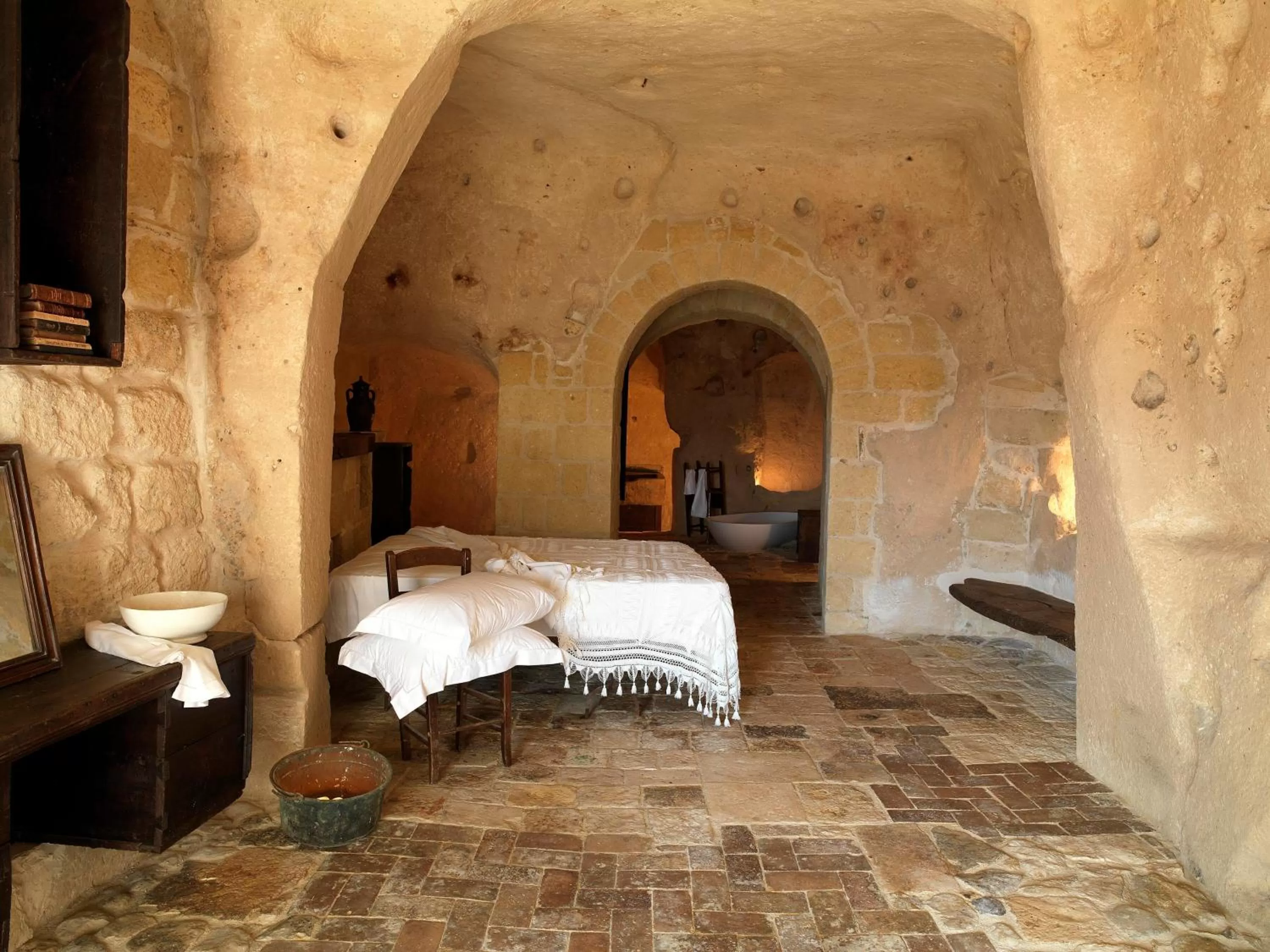 Photo of the whole room, Bed in Sextantio Le Grotte Della Civita