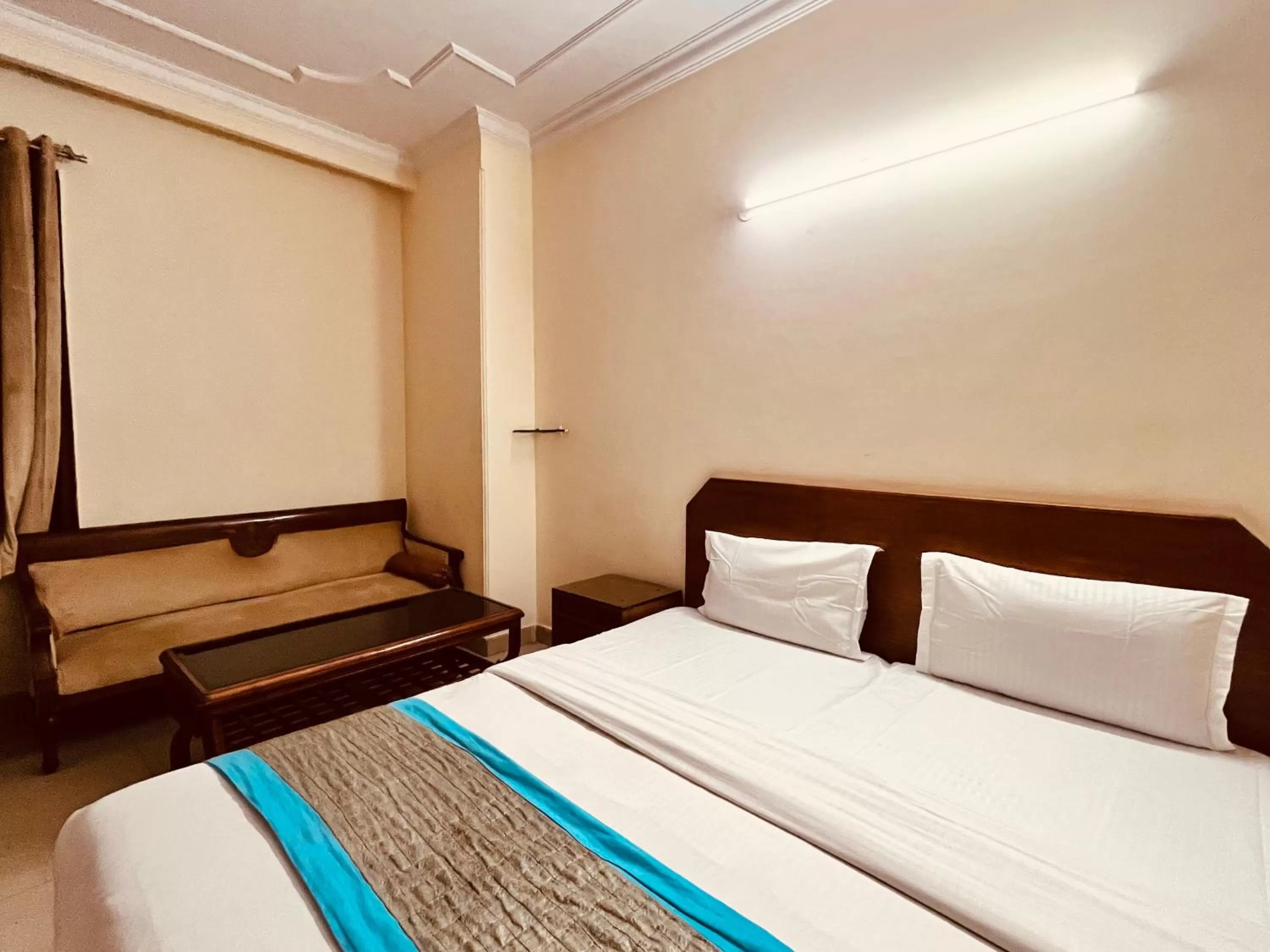 Bed in Ashoka Hotel Karol Bagh Delhi