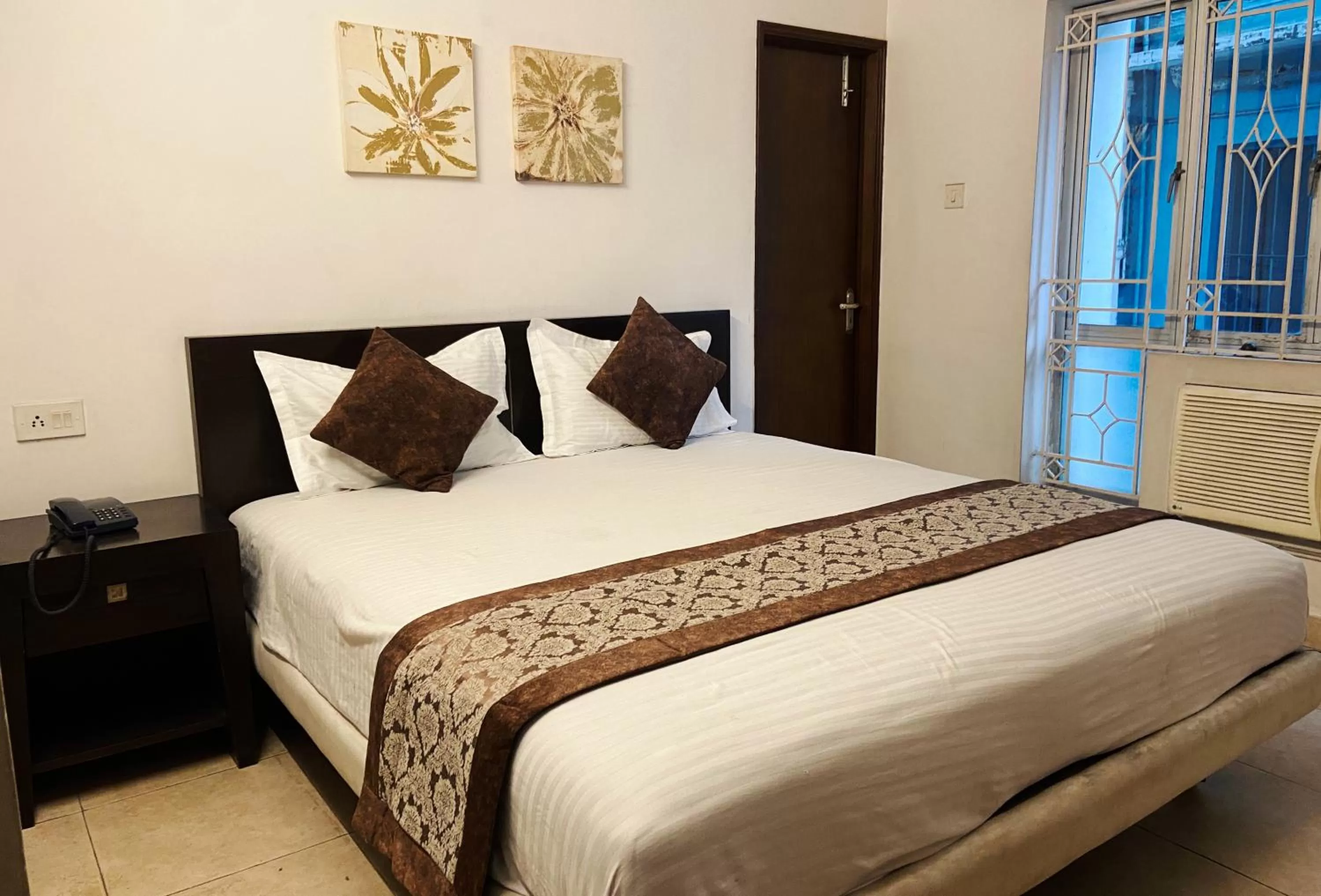 Bed in The Aster Homestay - Bedrooms & Apartments