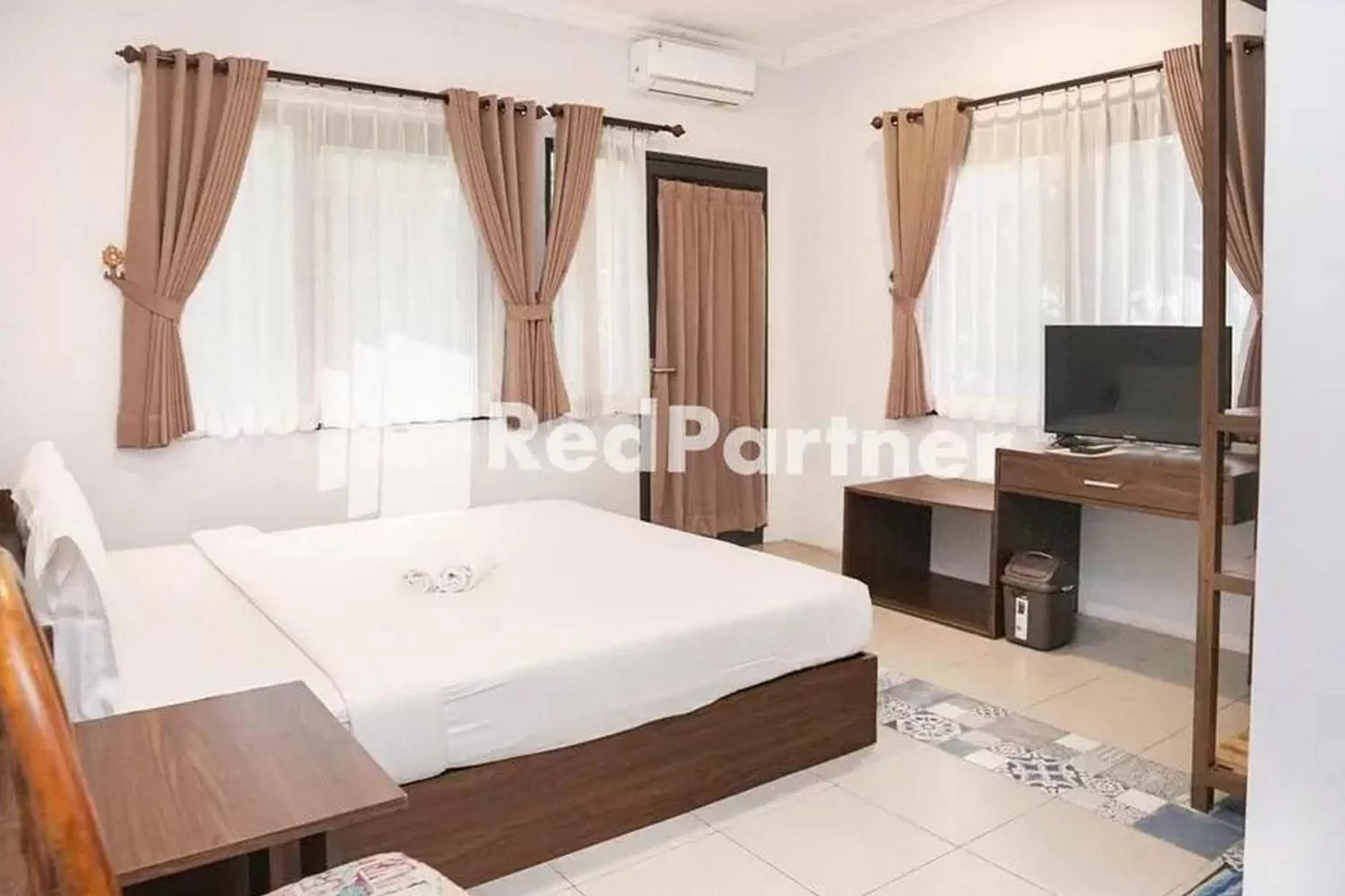Bed in Panorama Inn Residence Batu Redpartner