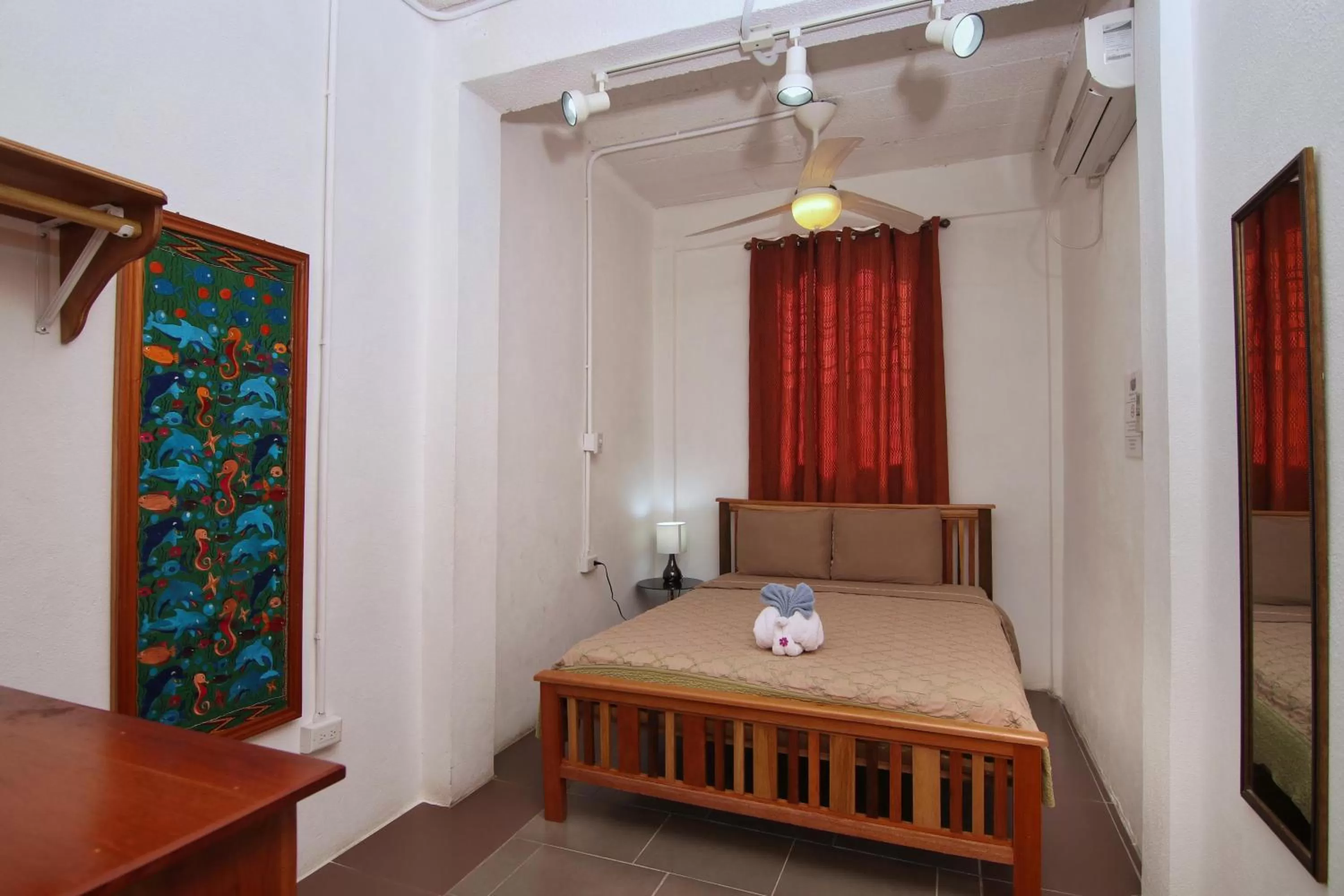 Bedroom, Bed in Rainforest Haven Inn