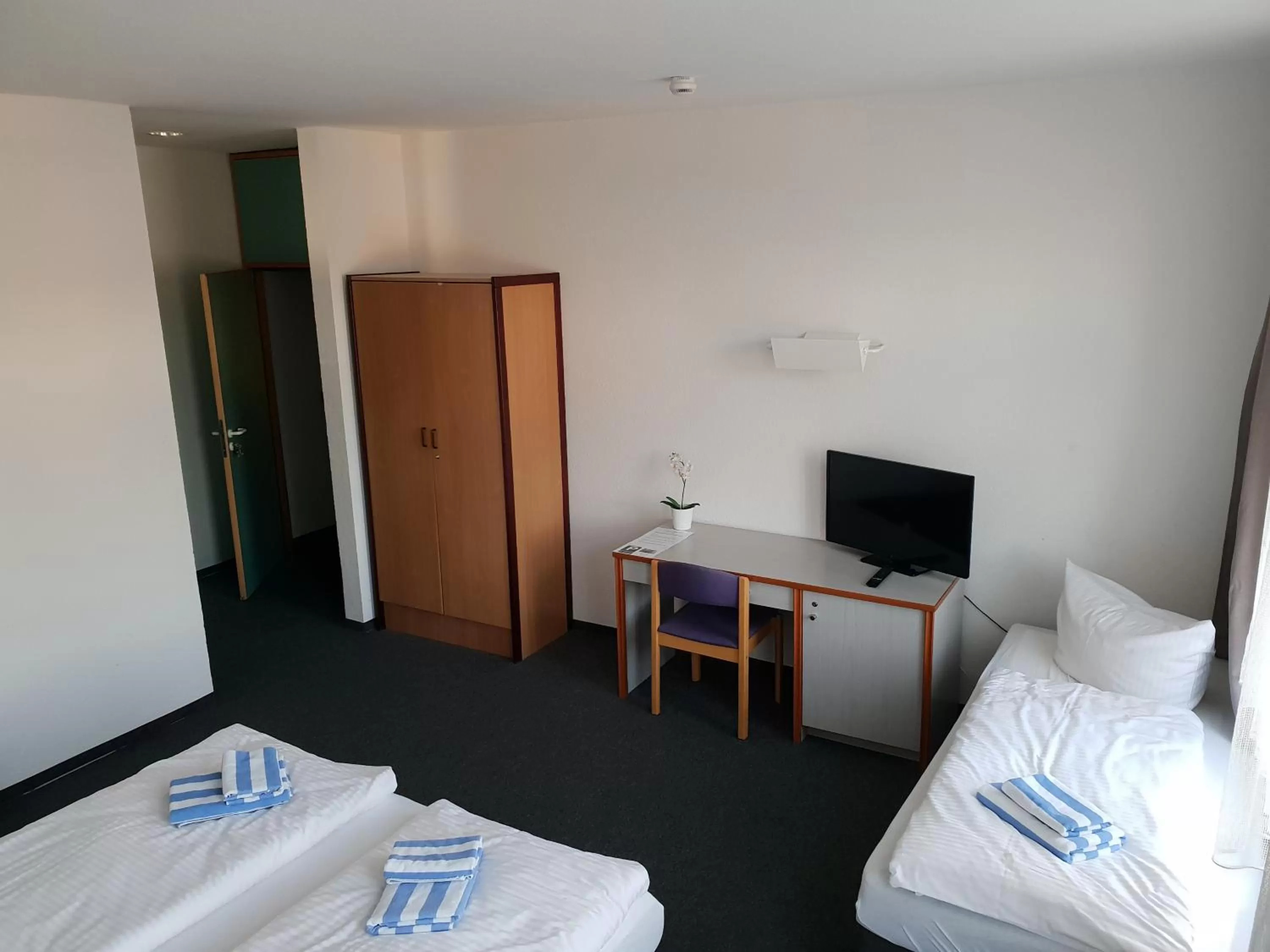 Bed in Appartement-Hotel Rostock