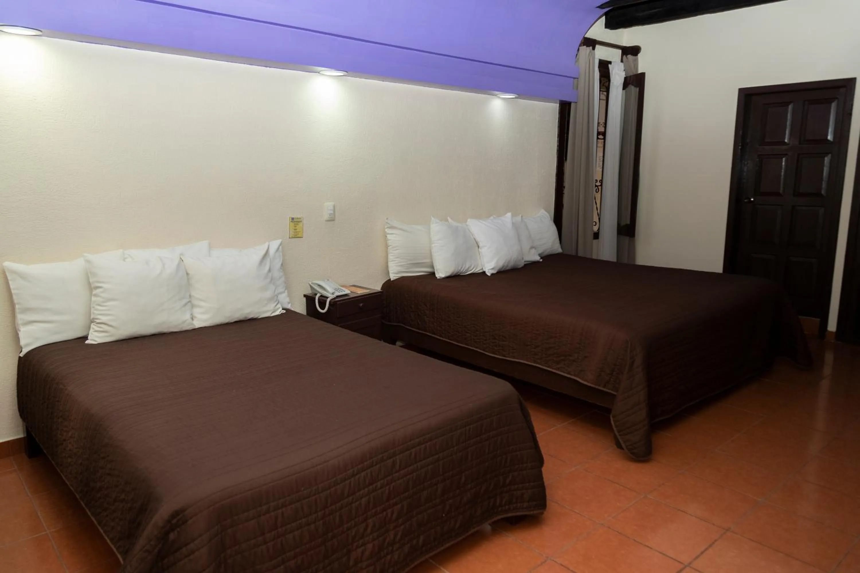 Bed in Hotel D’Monica