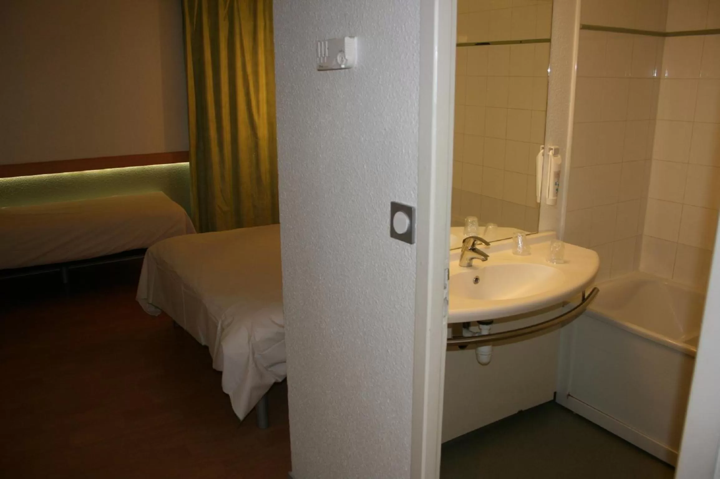 Bathroom, Bed in ibis budget Cannes Mougins