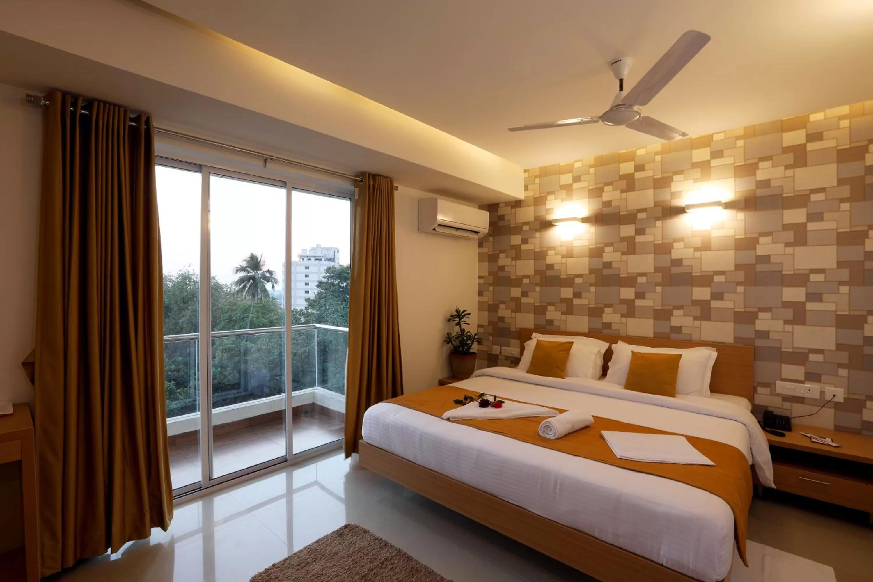 Bed in Grand Plaza Hotel