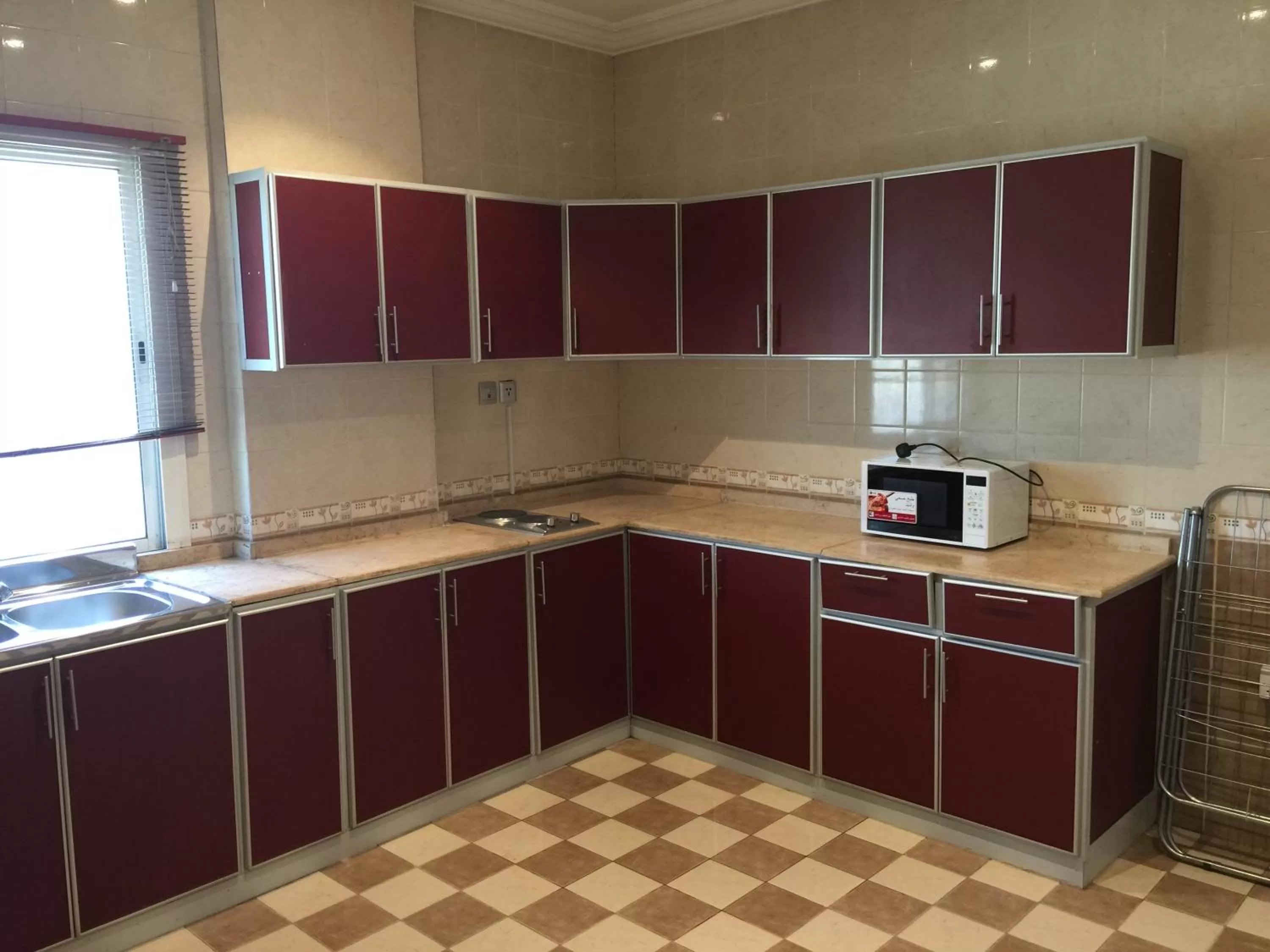 Kitchen/Kitchenette in Alshaheen Suites