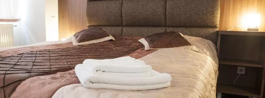 Bed in Garni Hotel Branc