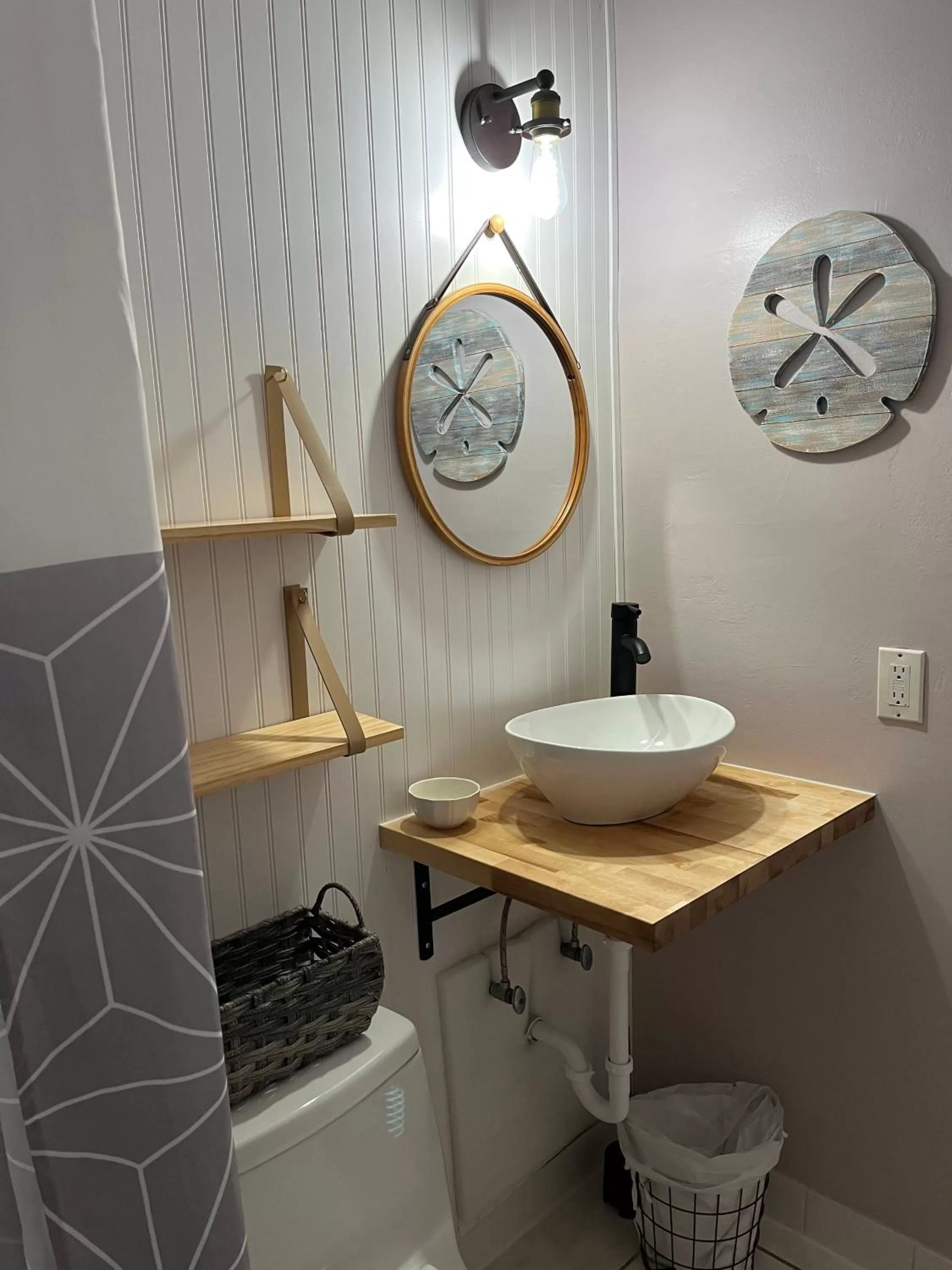 Bathroom in 4145 By The Sea Inn & Suites