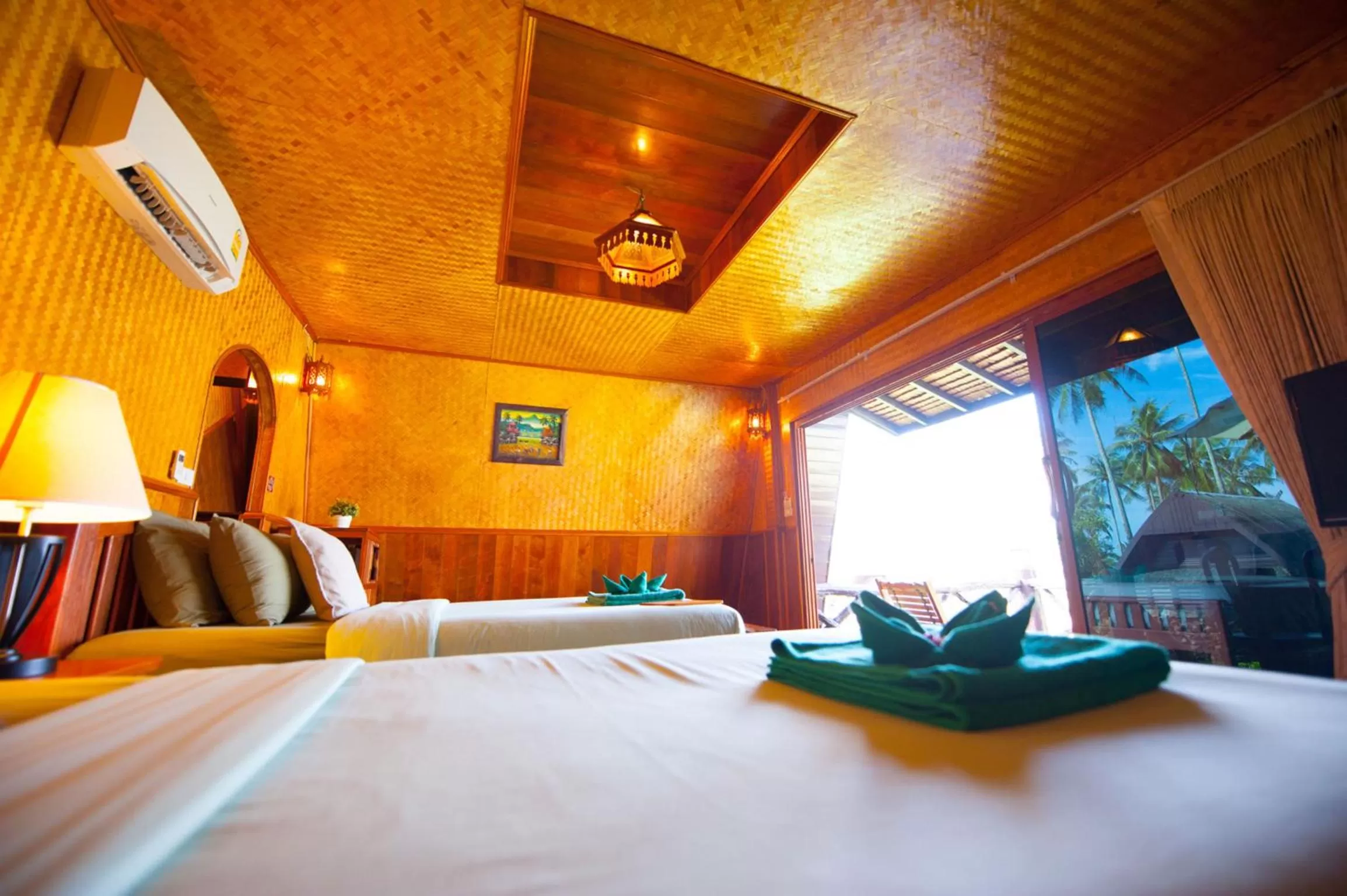 Bed in Koh Kood Beach Resort