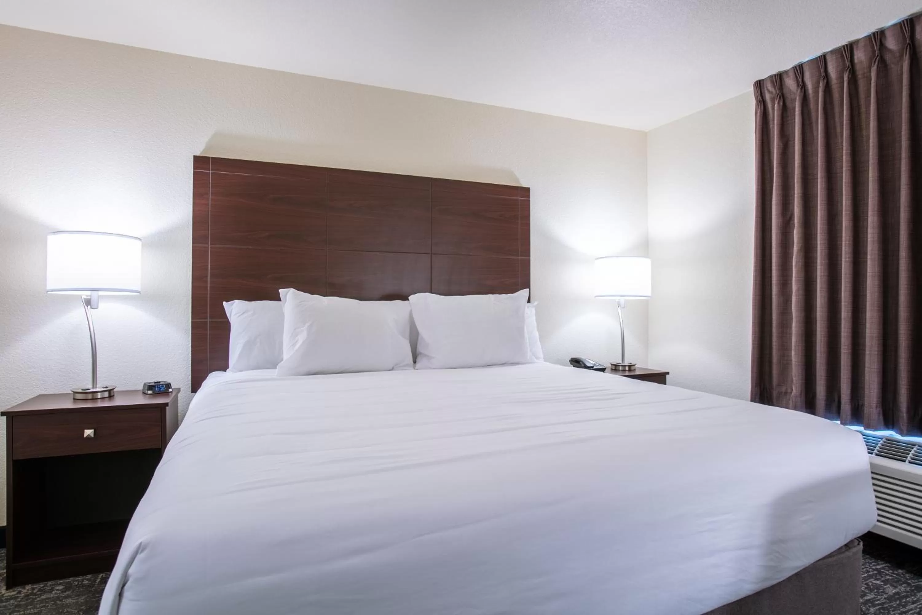 Bed in Cobblestone Inn & Suites - Pine Bluffs