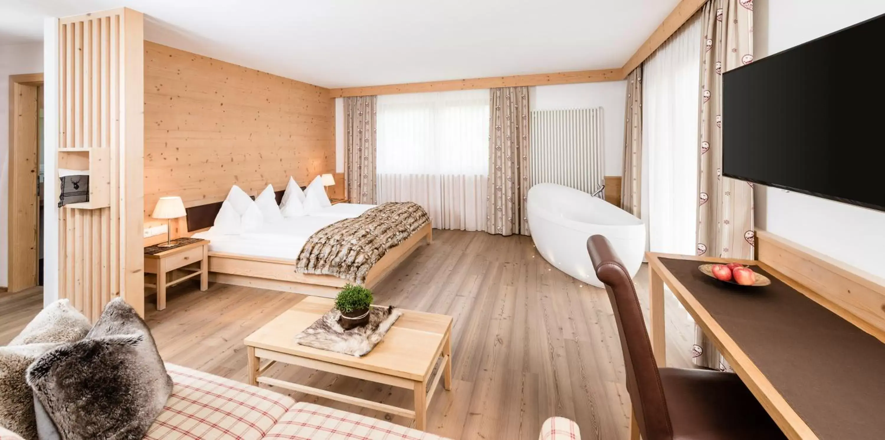 Junior Suite in Boutique Hotel Nives - Luxury & Design in the Dolomites Junior Suite in Boutique Hotel Nives - Luxury & Design in the Dolomites