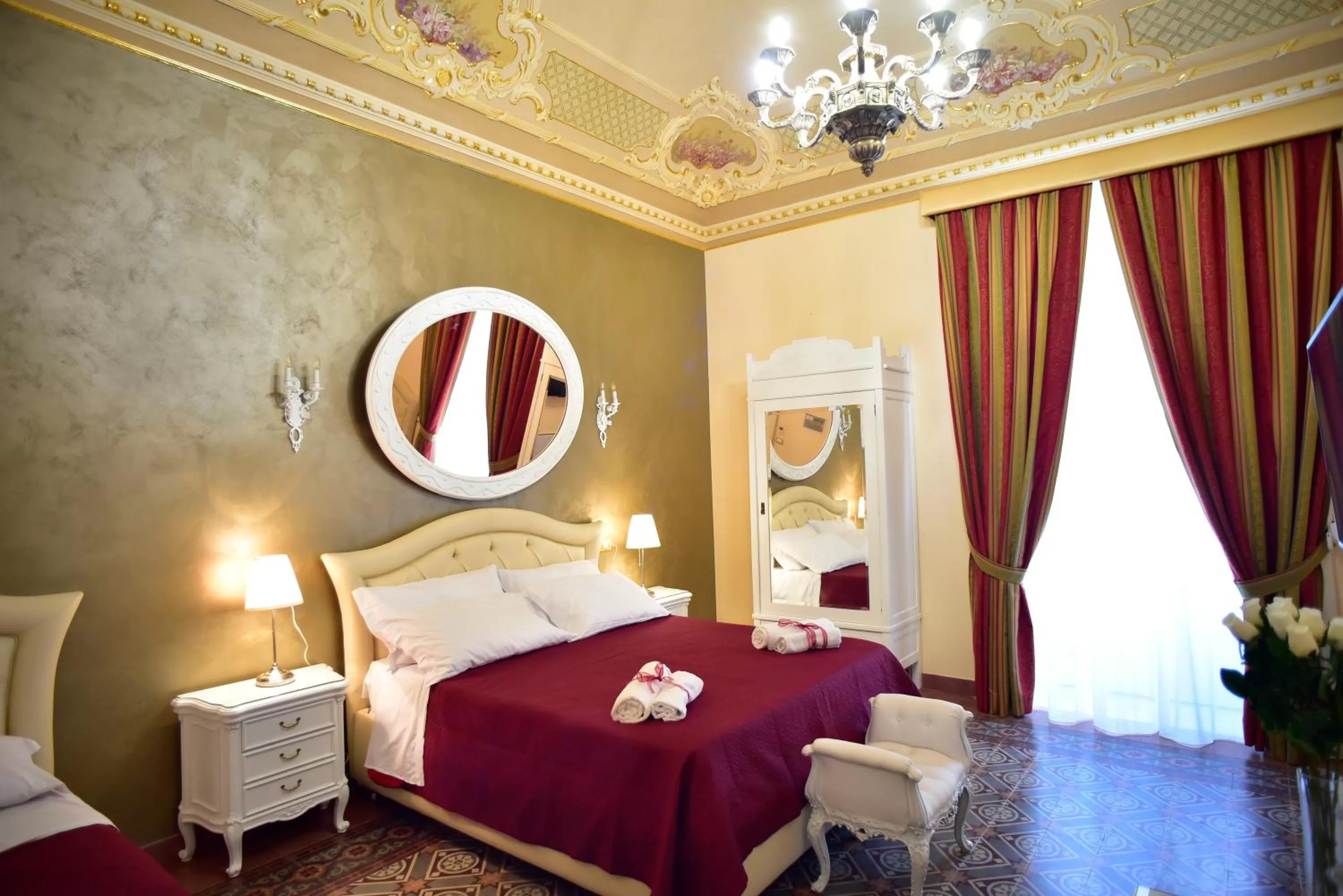 Photo of the whole room, Bed in Palazzo degli Affreschi