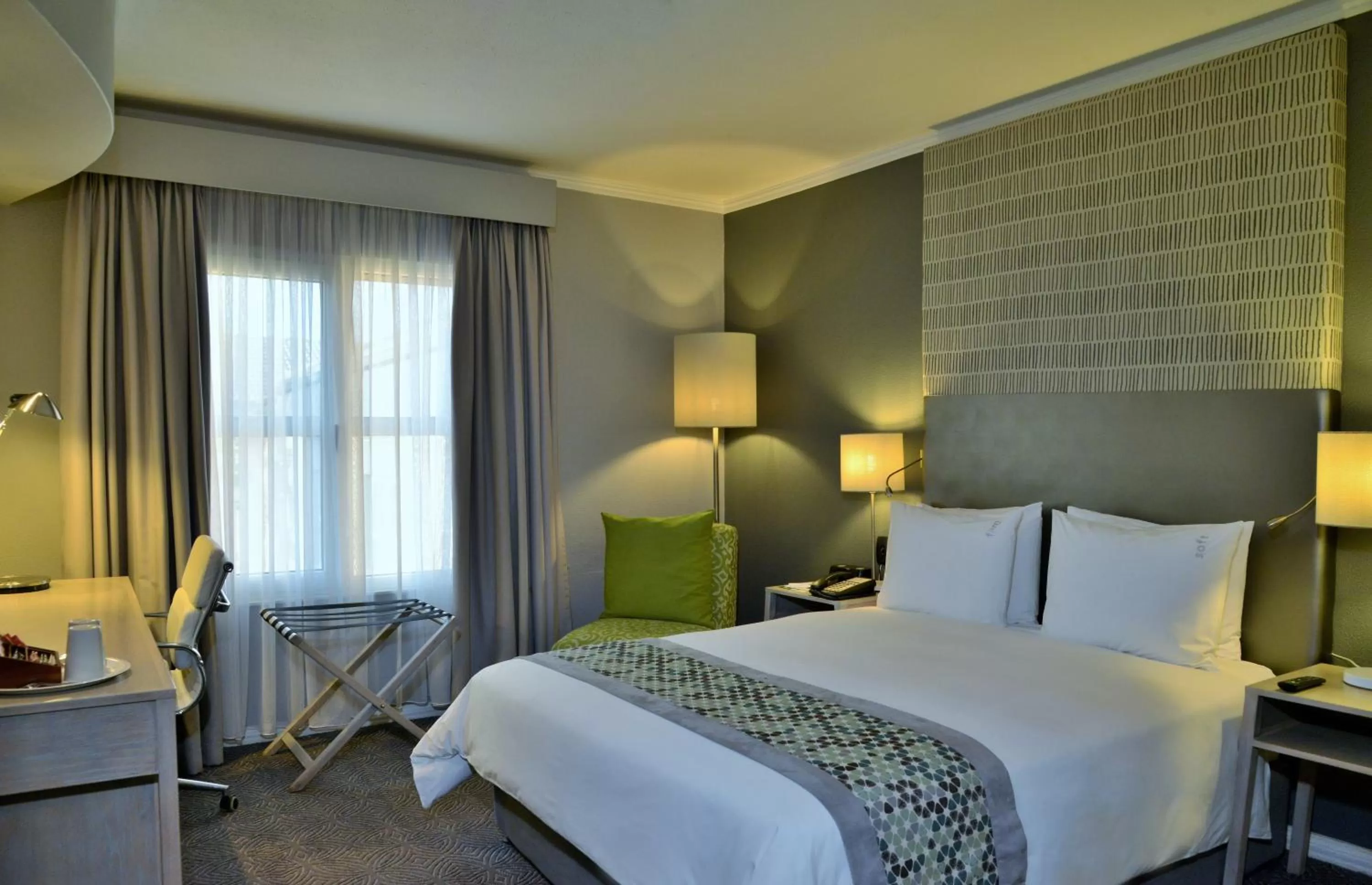 Bed in Holiday Inn Johannesburg OR Tambo Airport Hotel by IHG