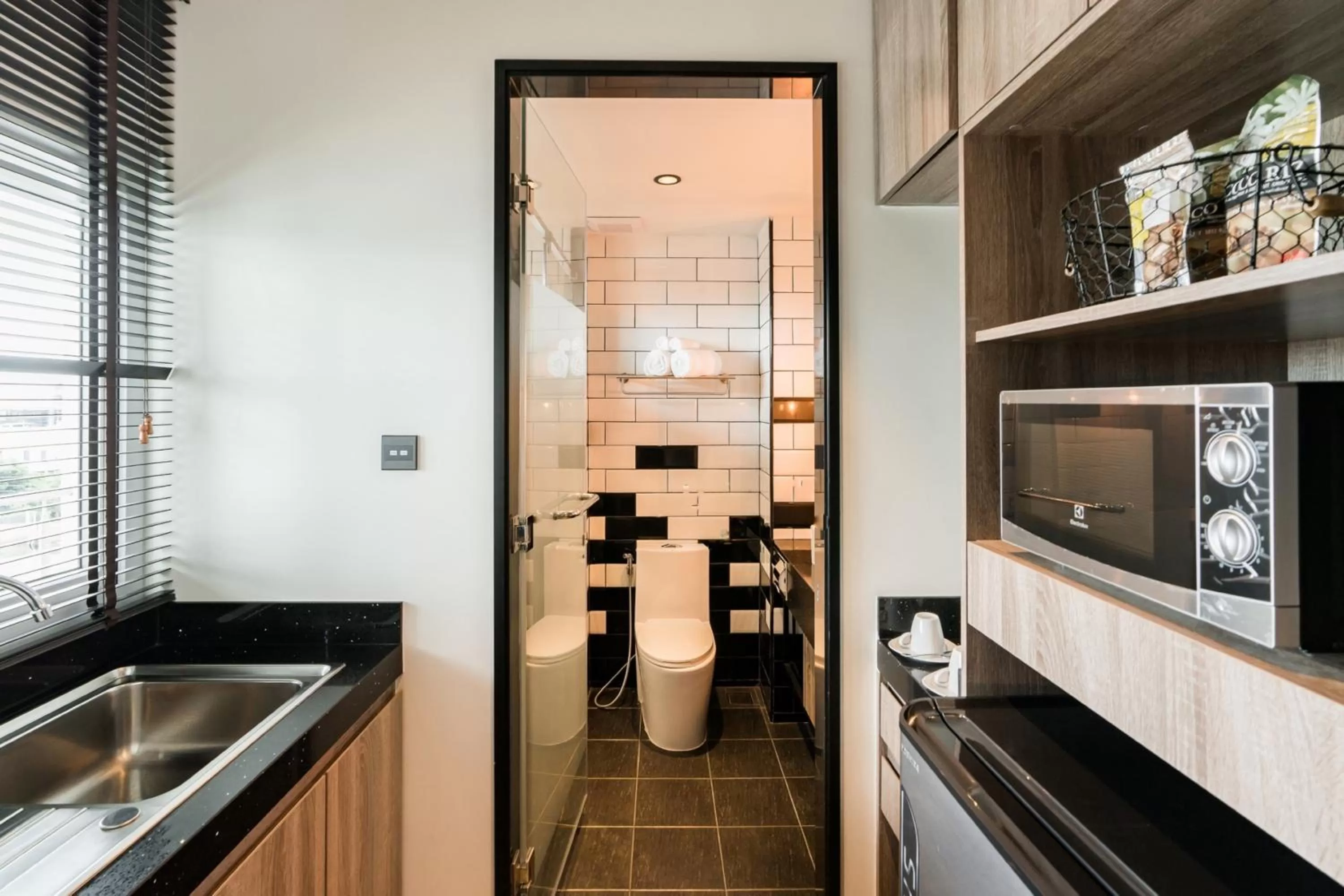 Bathroom in SureStay Plus by Best Western T Pattaya