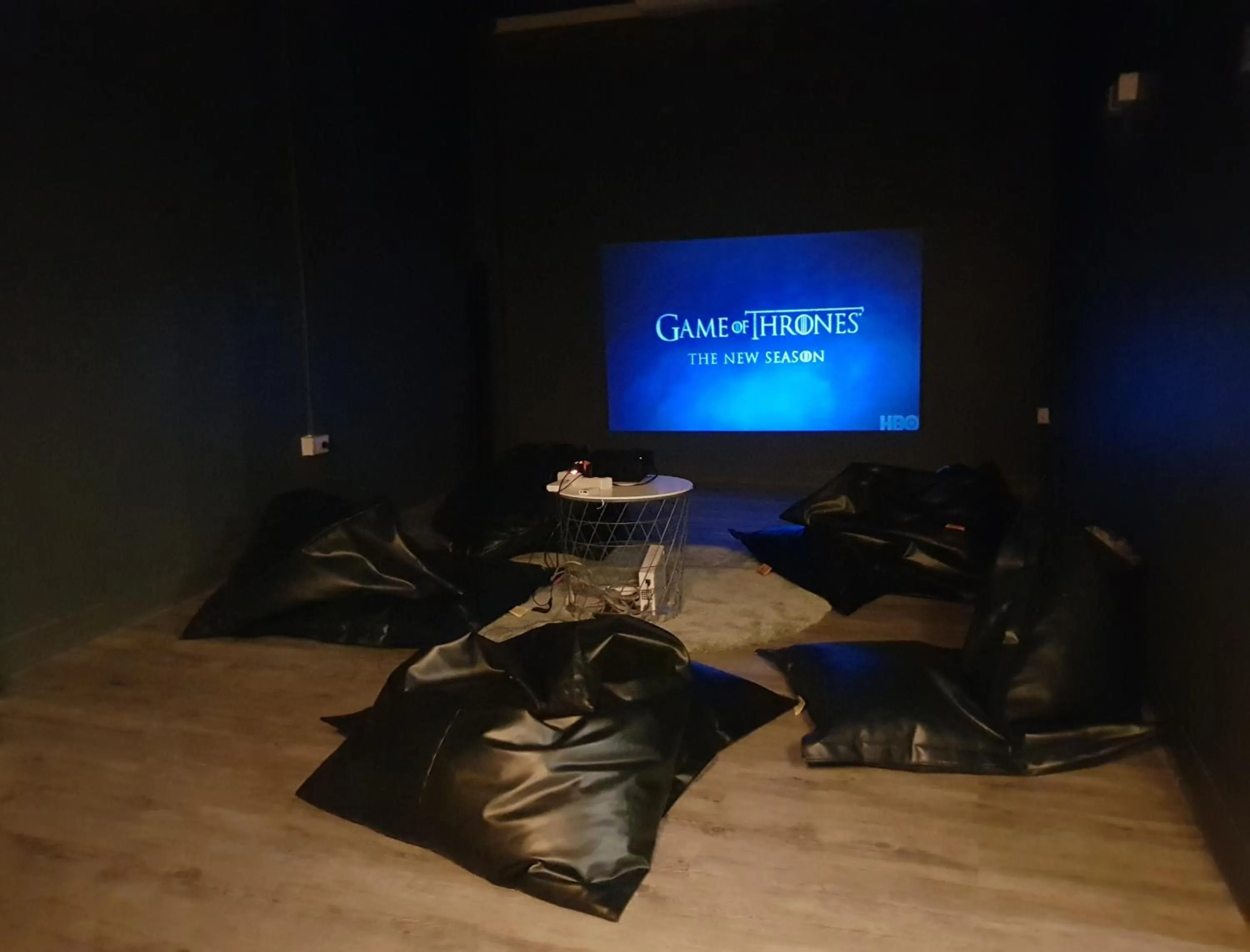 Communal lounge/ TV room in The Cocoon Hostel