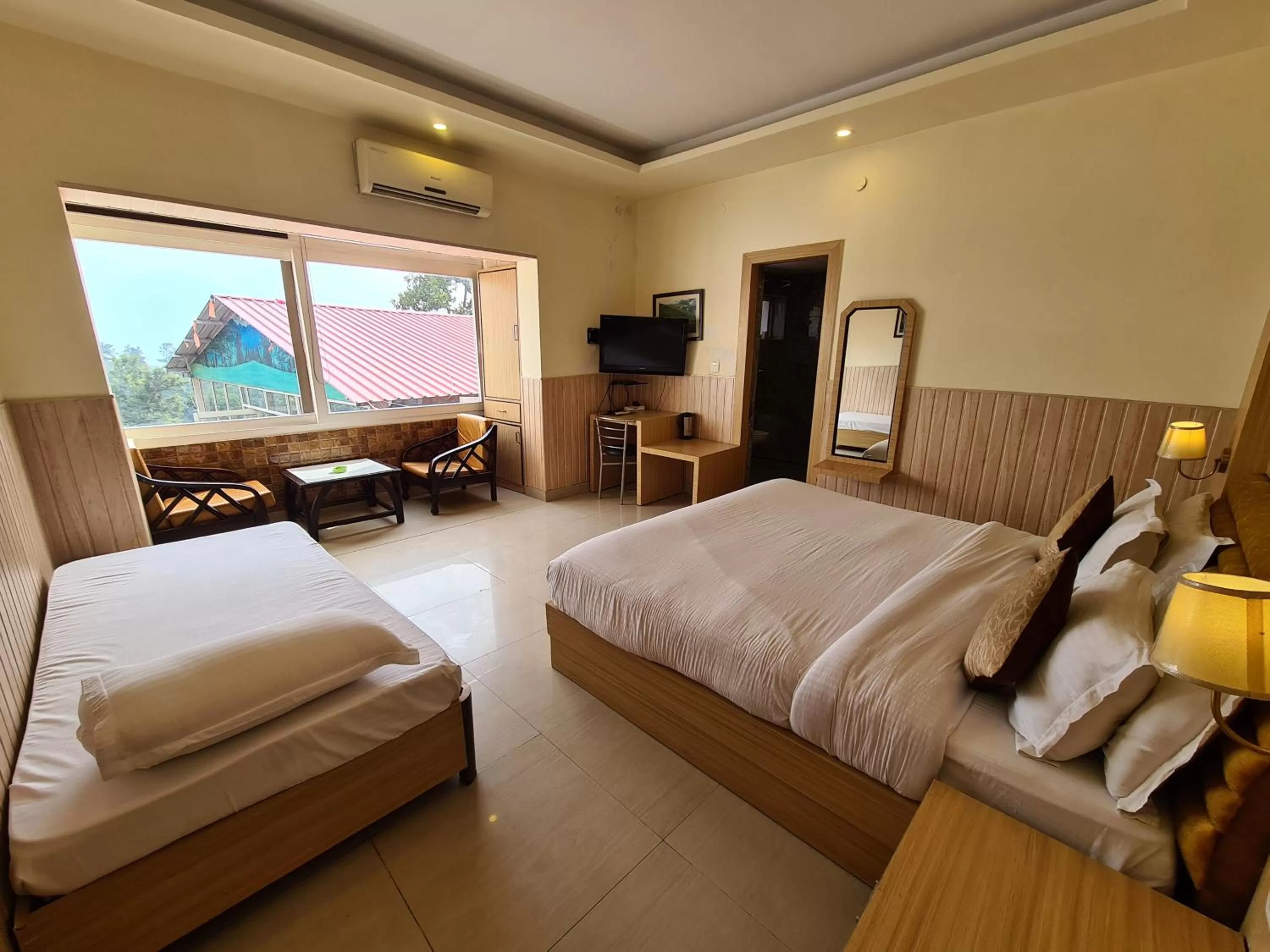 Bedroom, Bed in Hotel Rajpur Heights