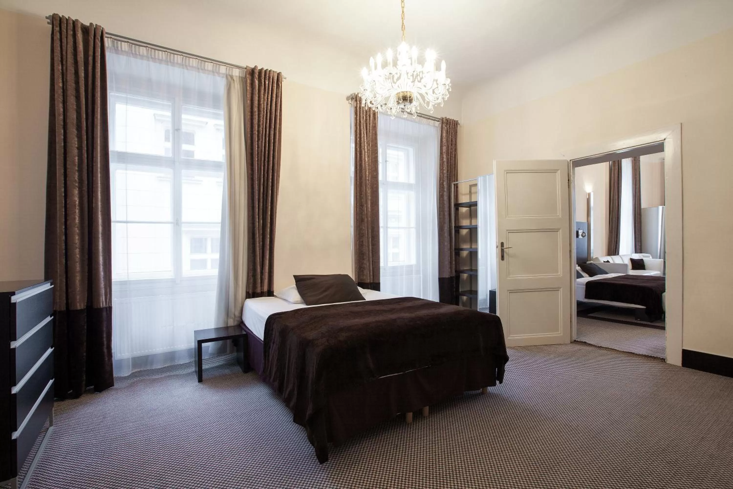 Bed in Old Town Square Residence by Emblem