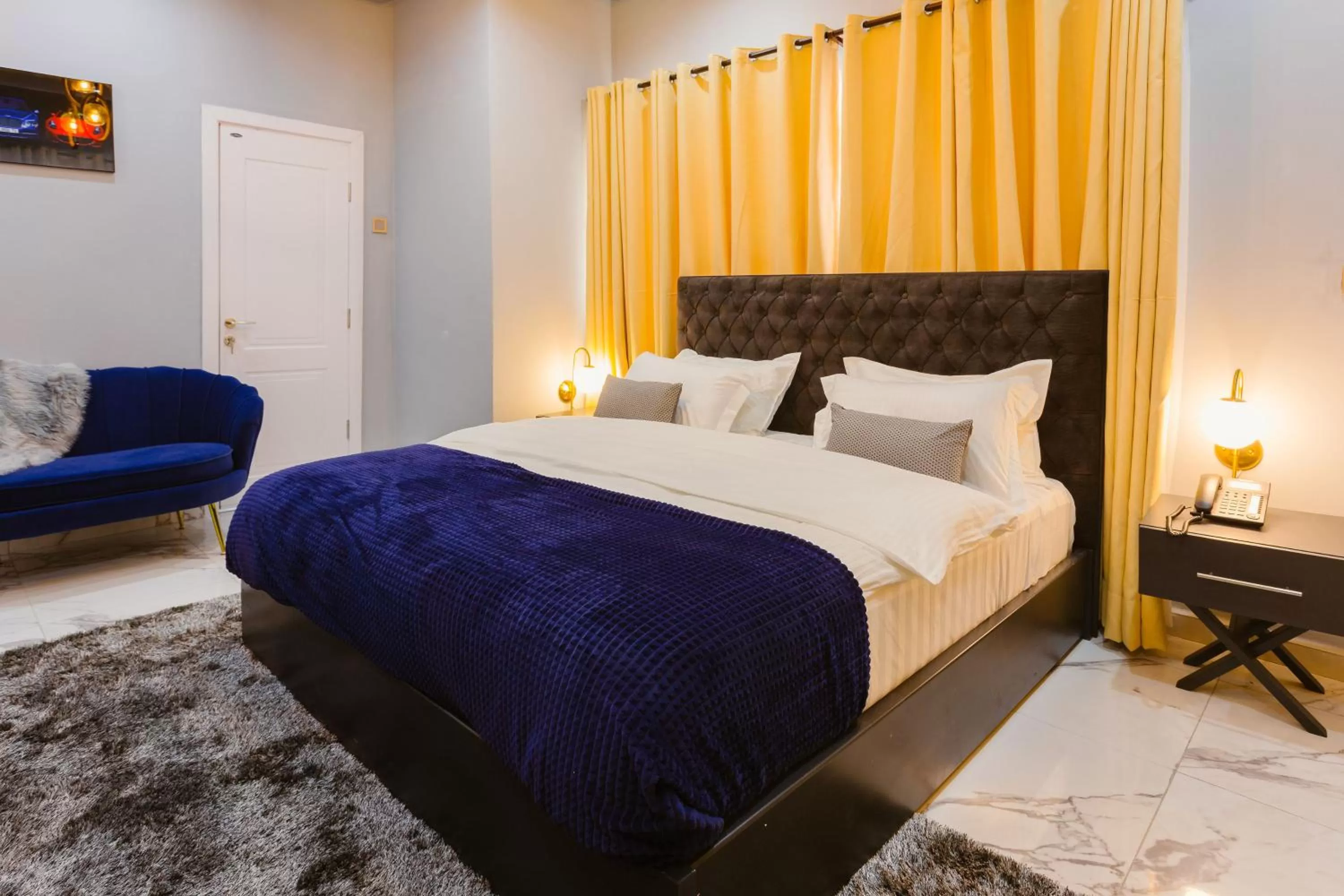 Bed in The Avery Suites, East Legon