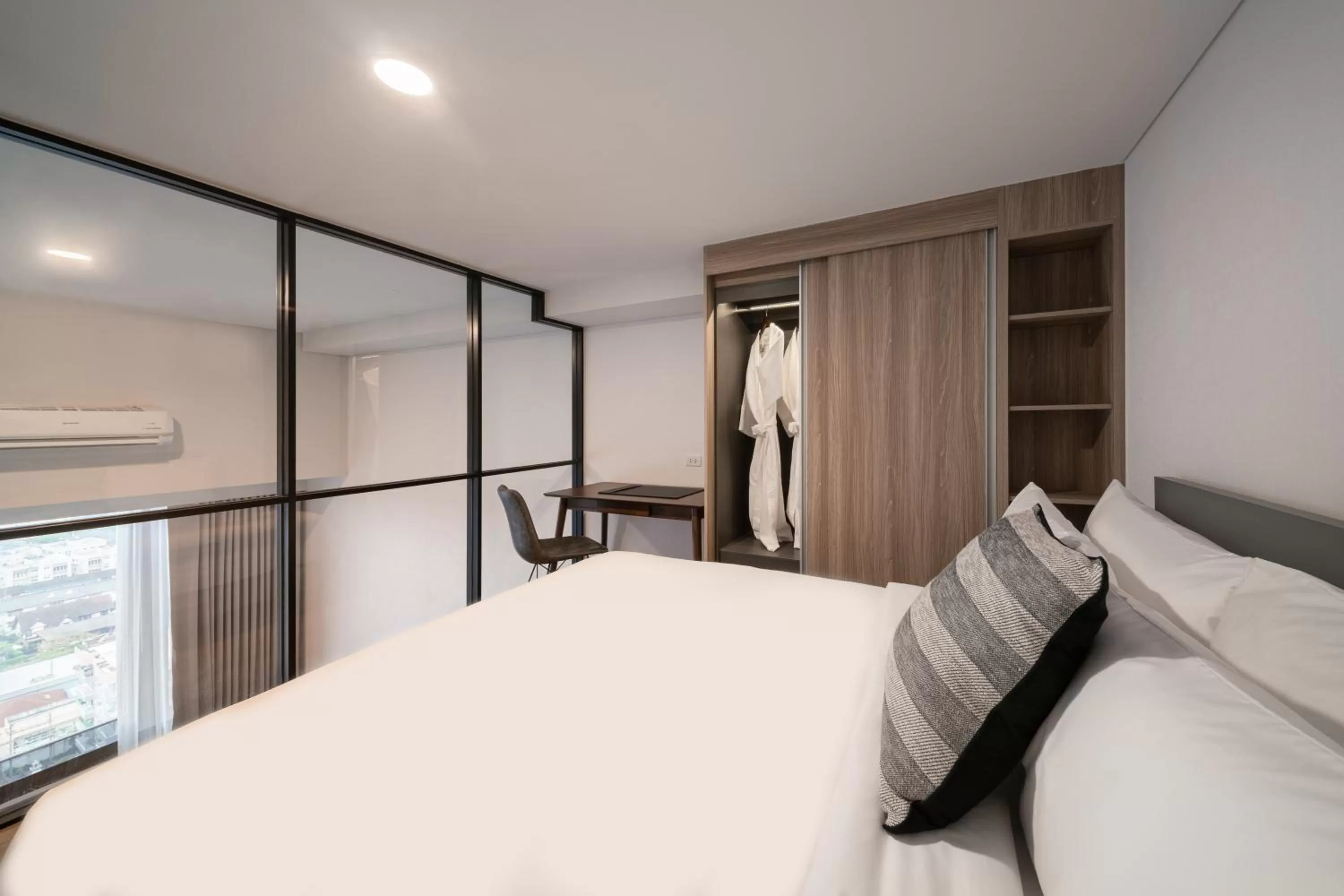 Bed in Ramada By Wyndham Bangkok Sukhumvit 87