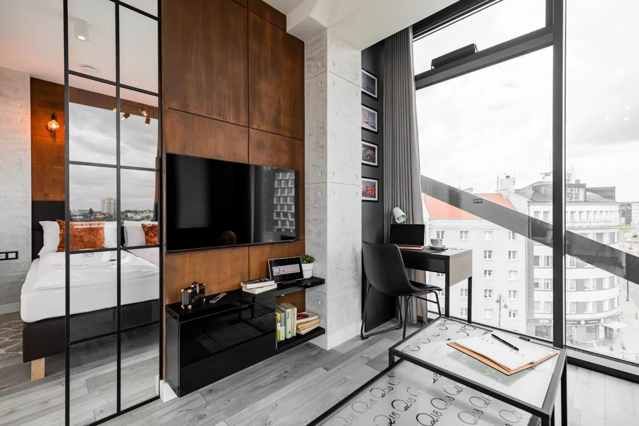 Communal lounge/ TV room, Bed in Q18 ApartHotel