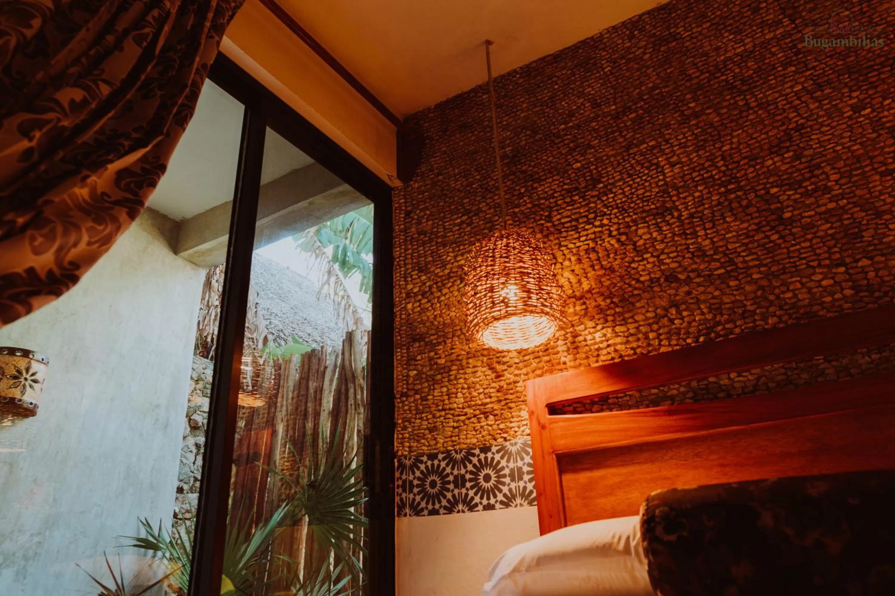 Photo of the whole room in Hotel Boutique Bugambilias