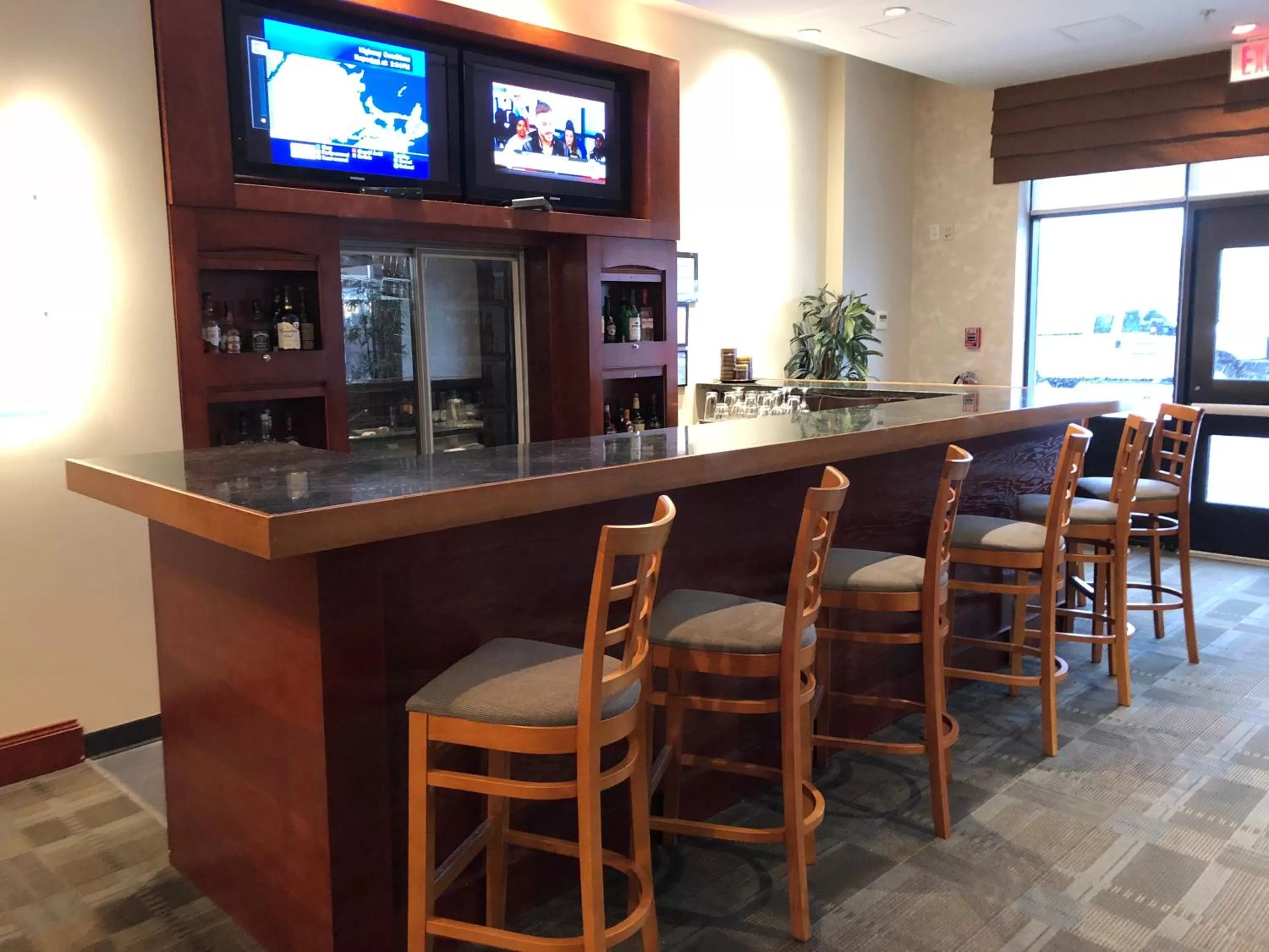 Lounge or bar in Chateau Saint John Trademark Collection by Wyndham