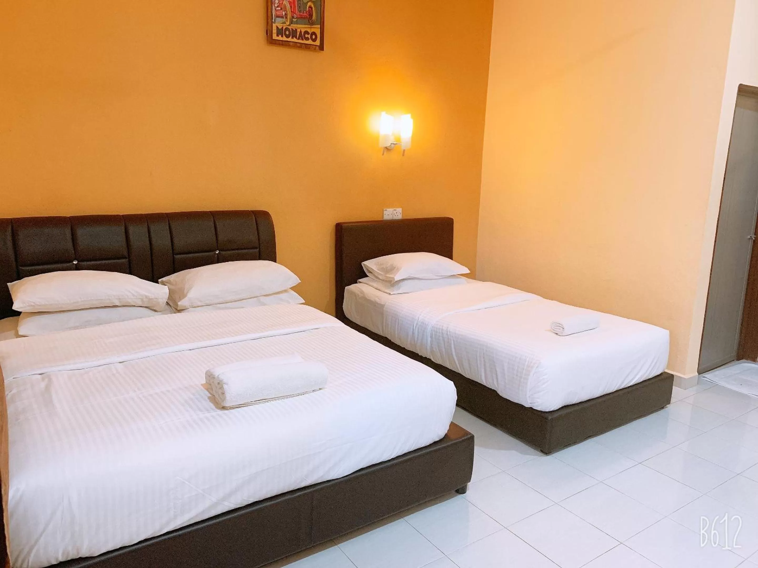 Photo of the whole room, Bed in Dhania Cenang Beach Motel