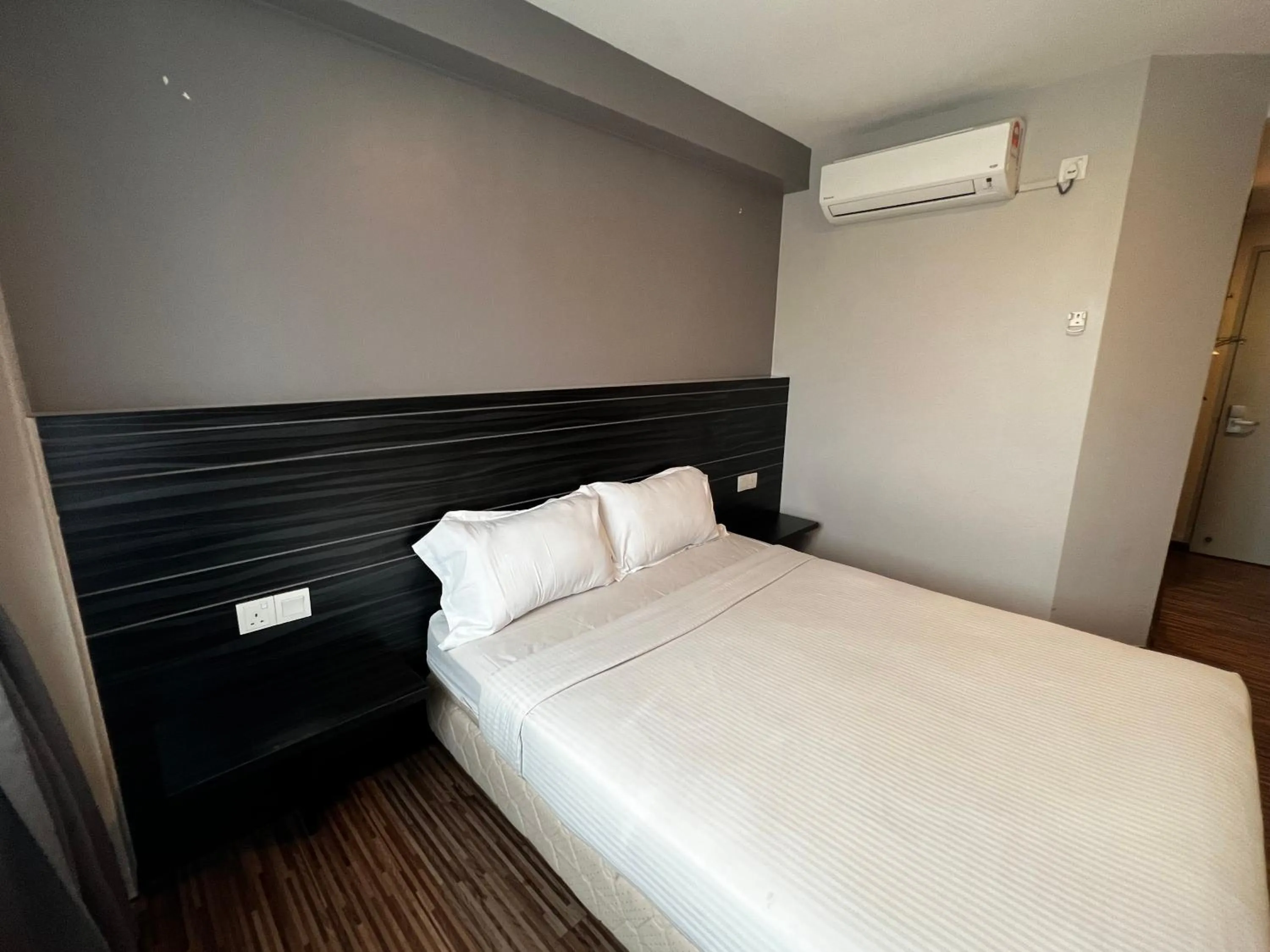 Bed in Signature Hotel