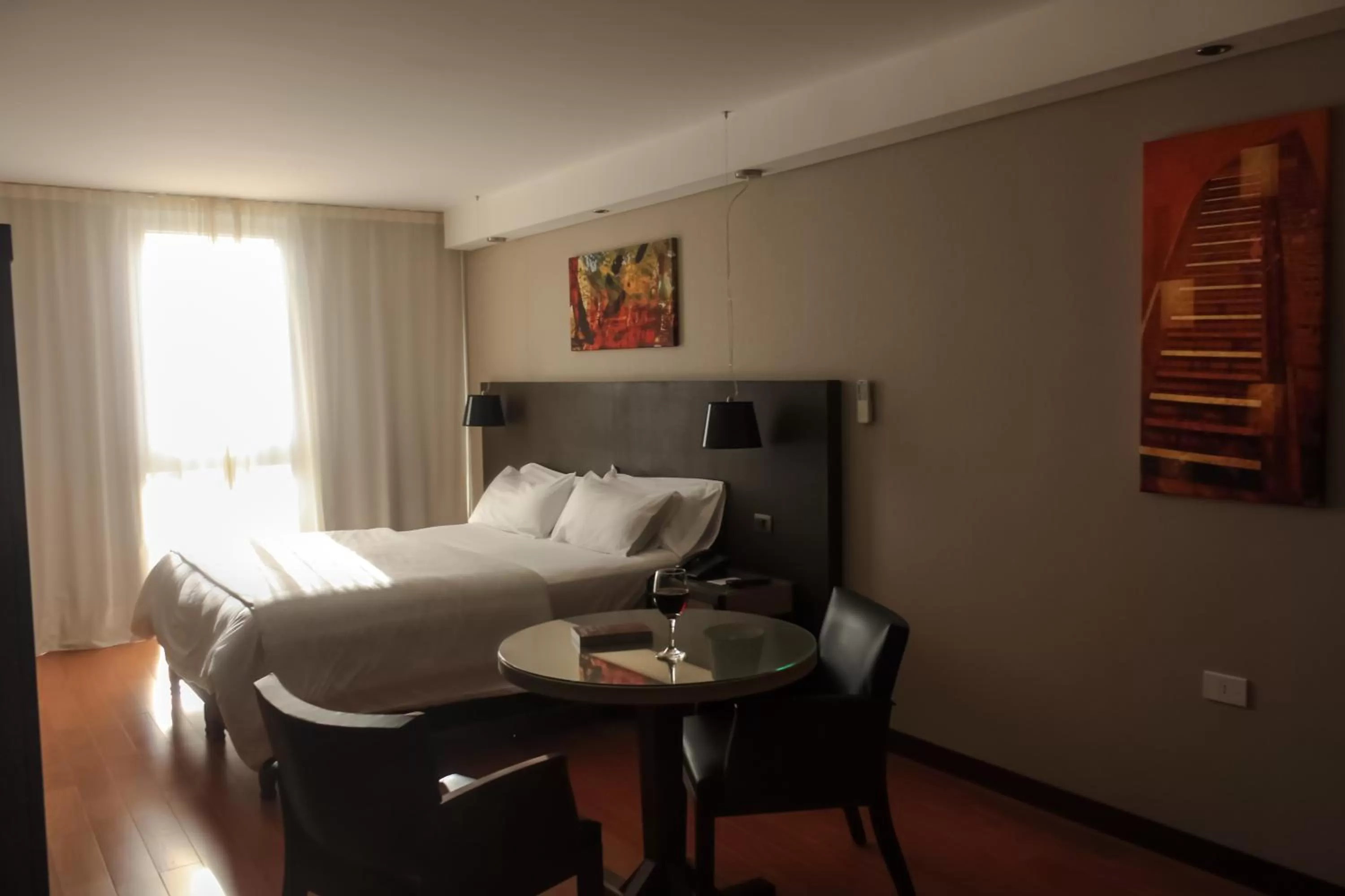 Bedroom in AXSUR Design Hotel