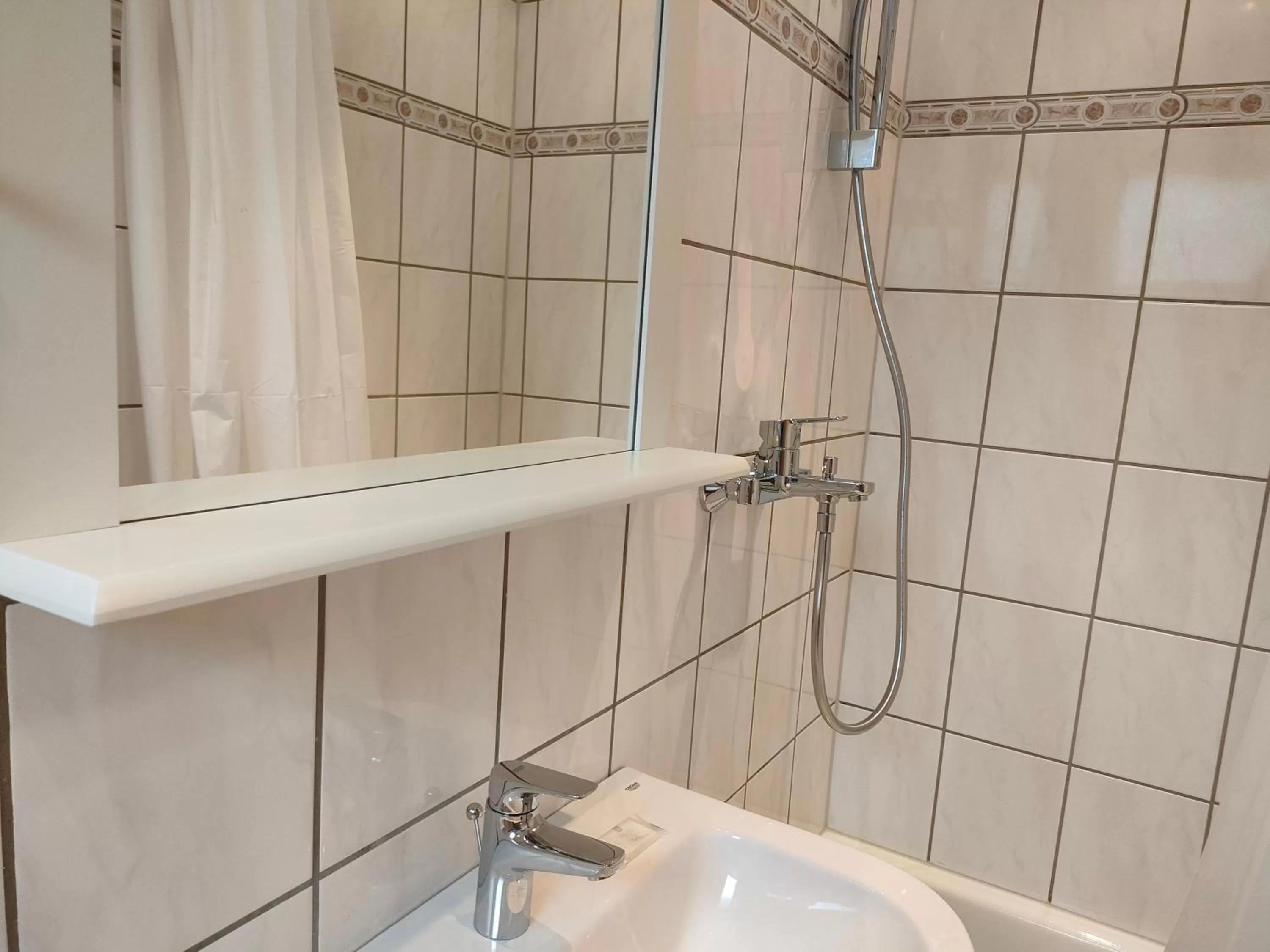 Bathroom in AM BERG Hotel