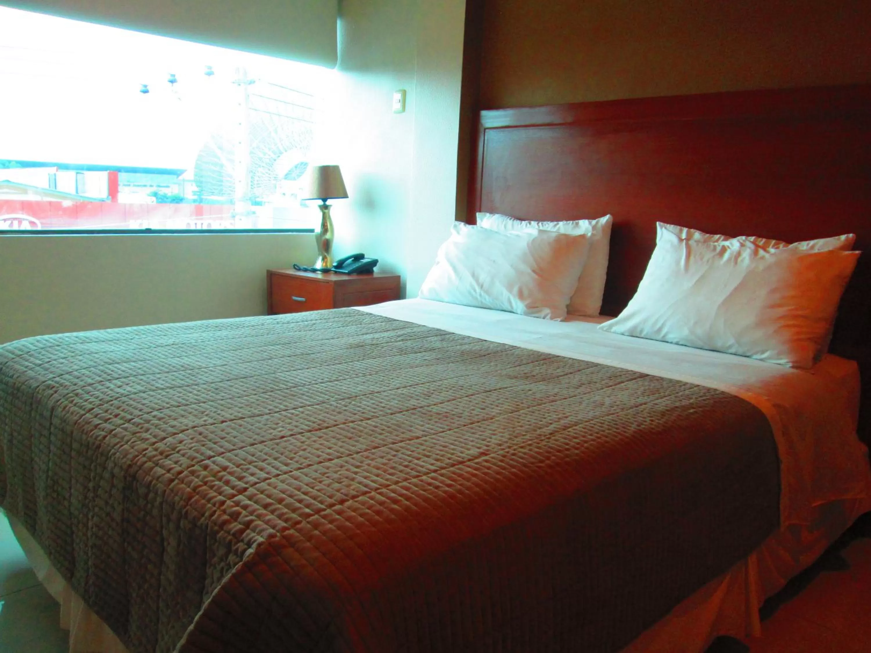 Bed in Hotel Garzota Inn