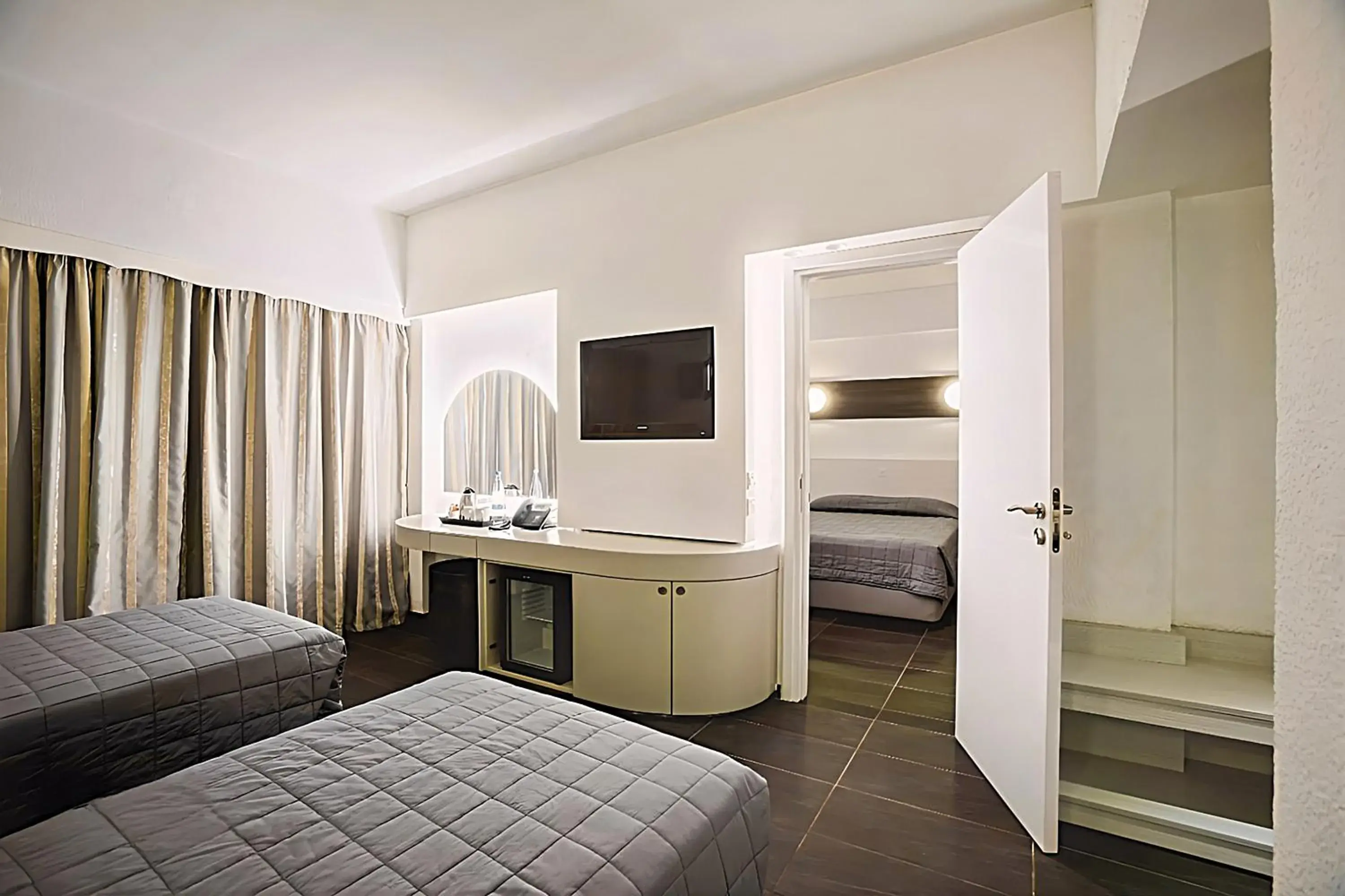 Family Interconnecting Room with Balcony in Sveltos Hotel Family Interconnecting Room with Balcony in Sveltos Hotel