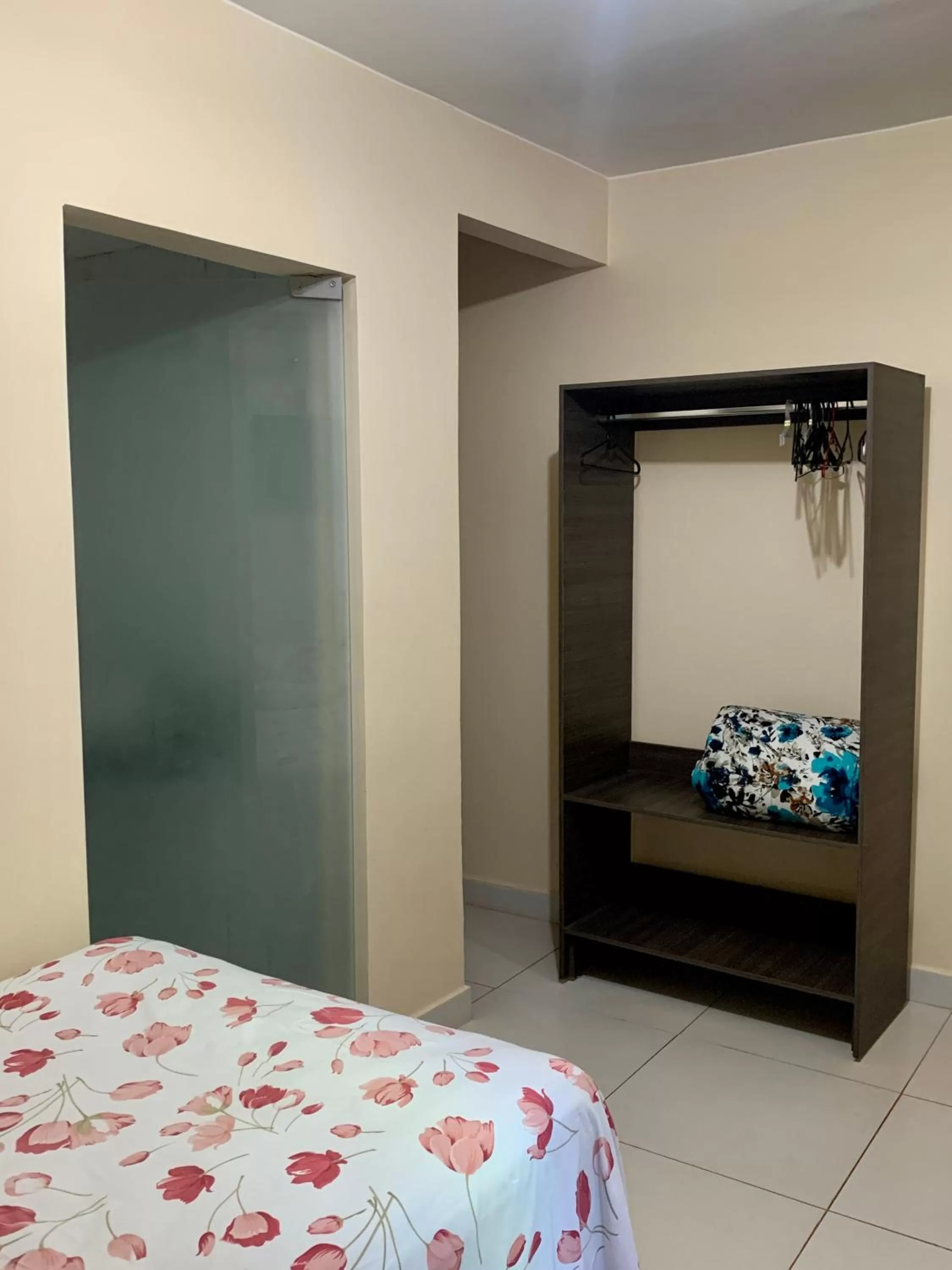 Bed in Pousada Jardim Brasília