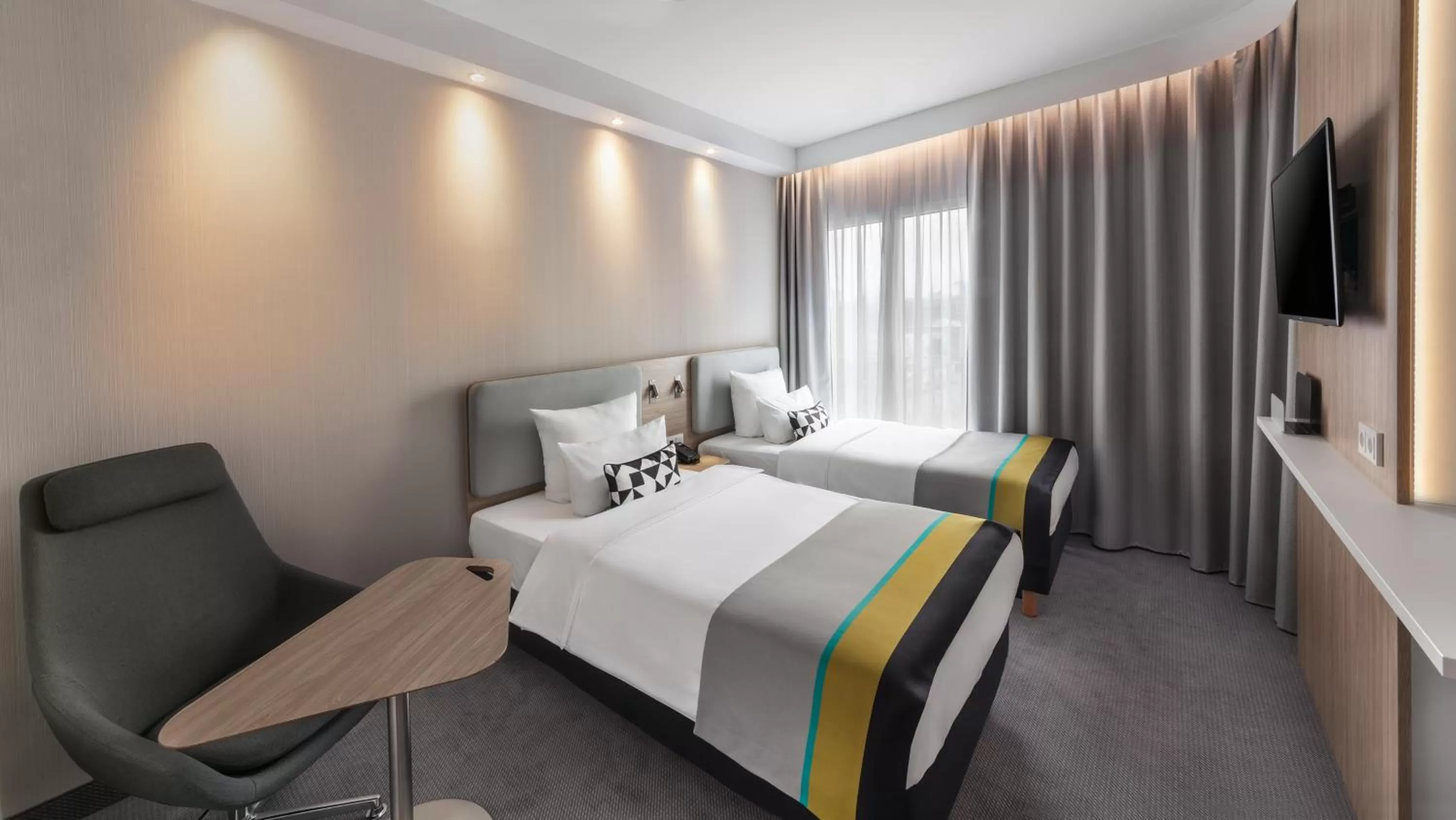 Photo of the whole room, Bed in Holiday Inn Express Munich - City East by IHG