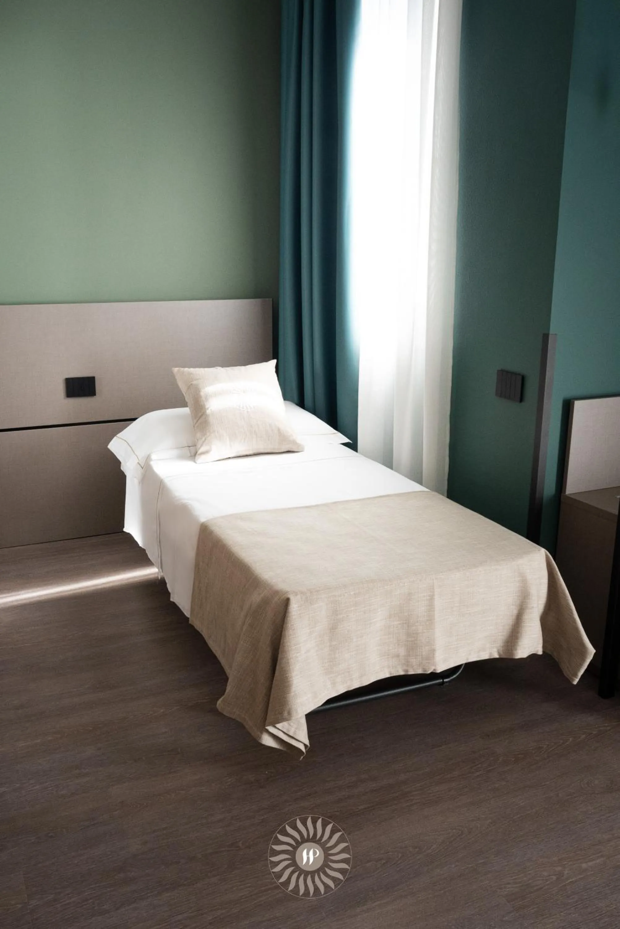 Bed in Hotel Puccini