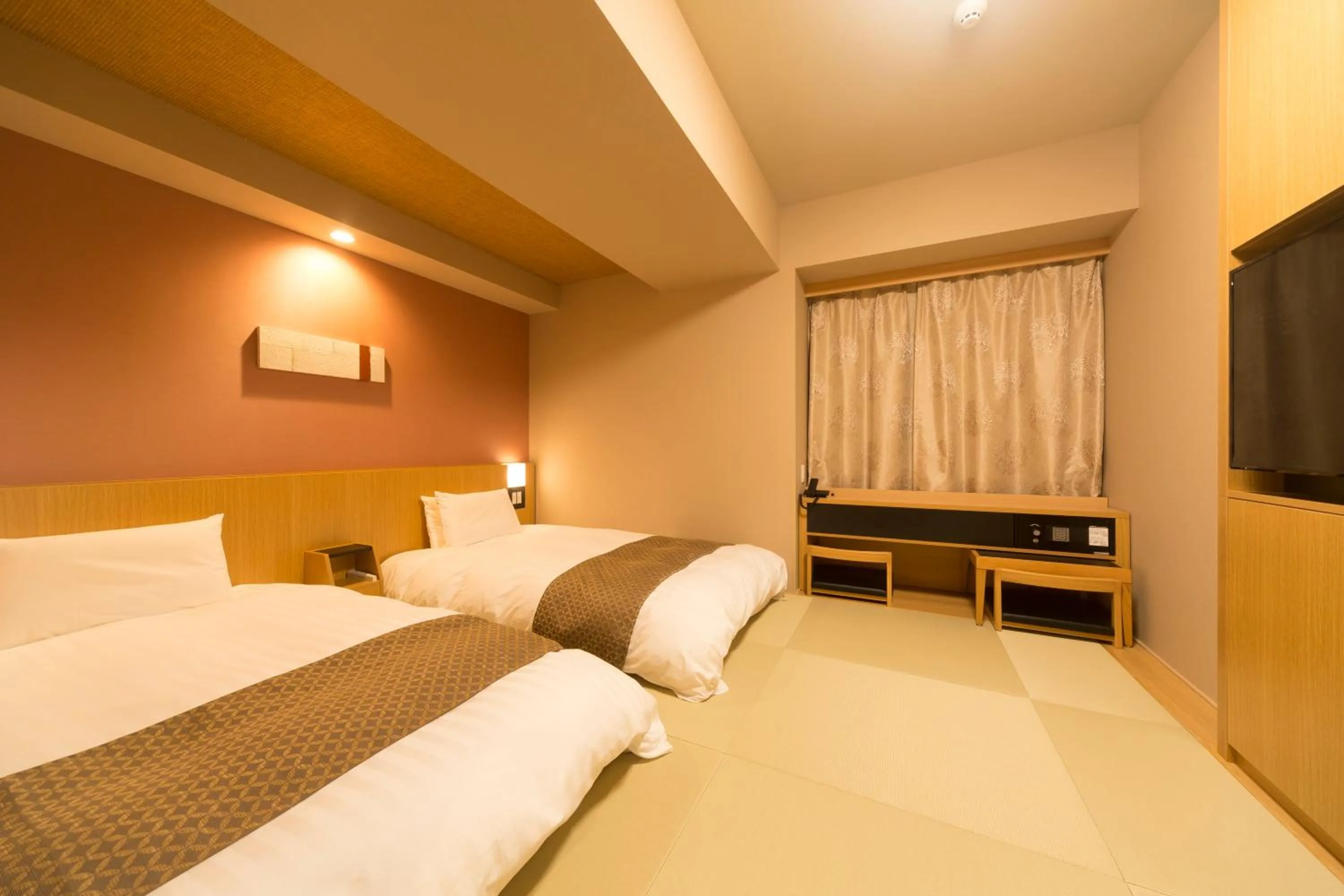 Bed in Dormy Inn Premium Tokyo Kodenmacho