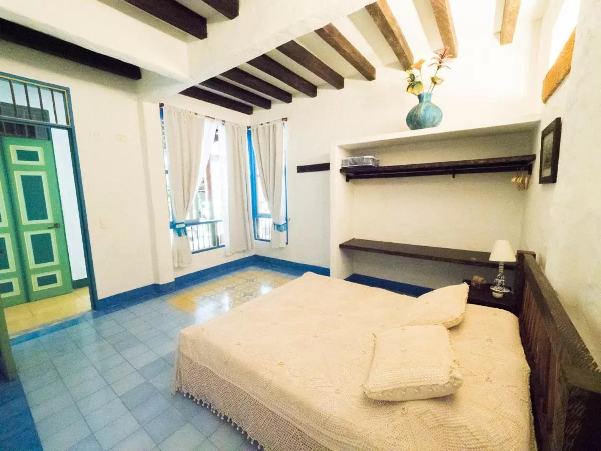 Bed in El Despertar Hotel