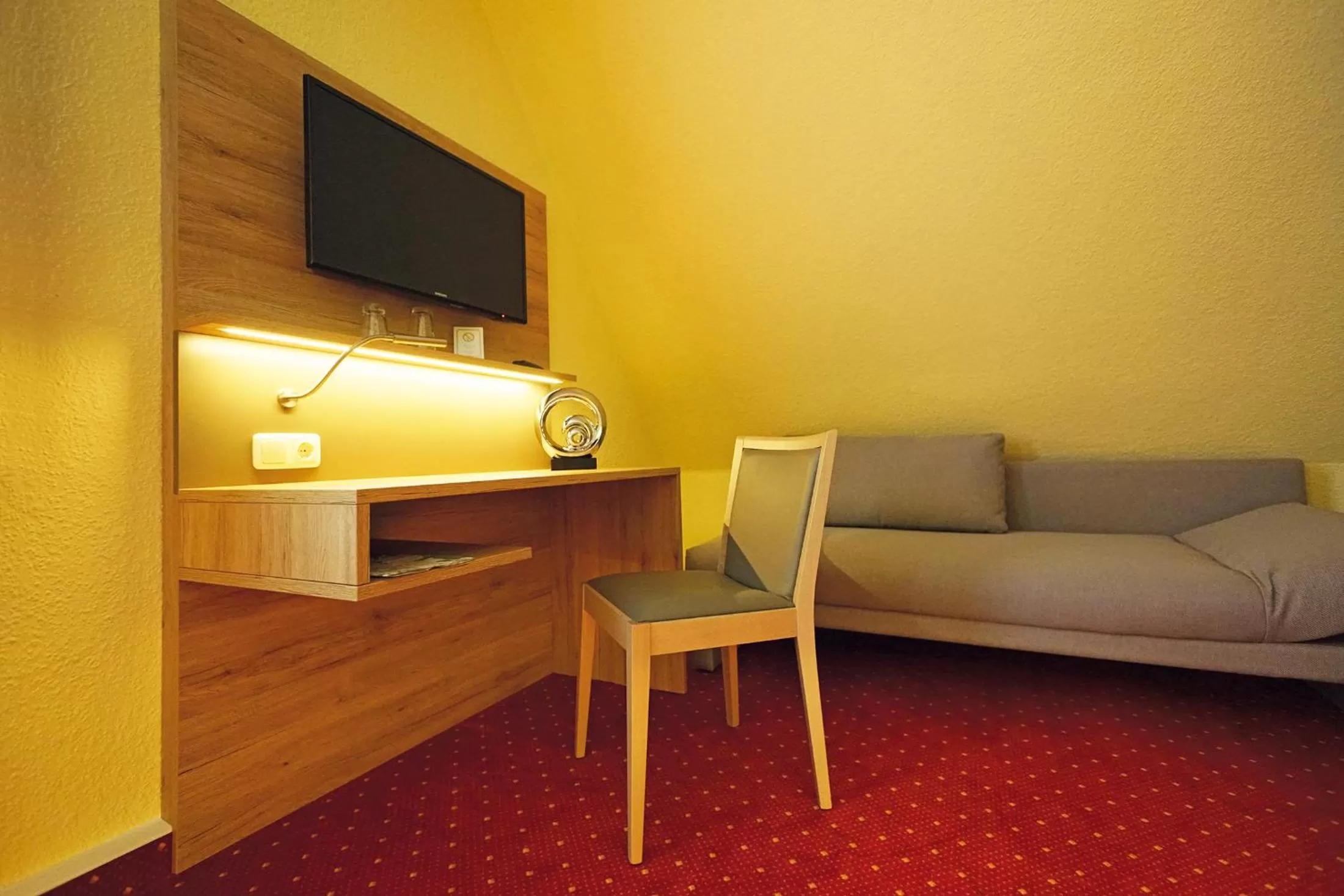 TV and multimedia, TV/Entertainment Center in Hotel und Restaurant Bühlhaus