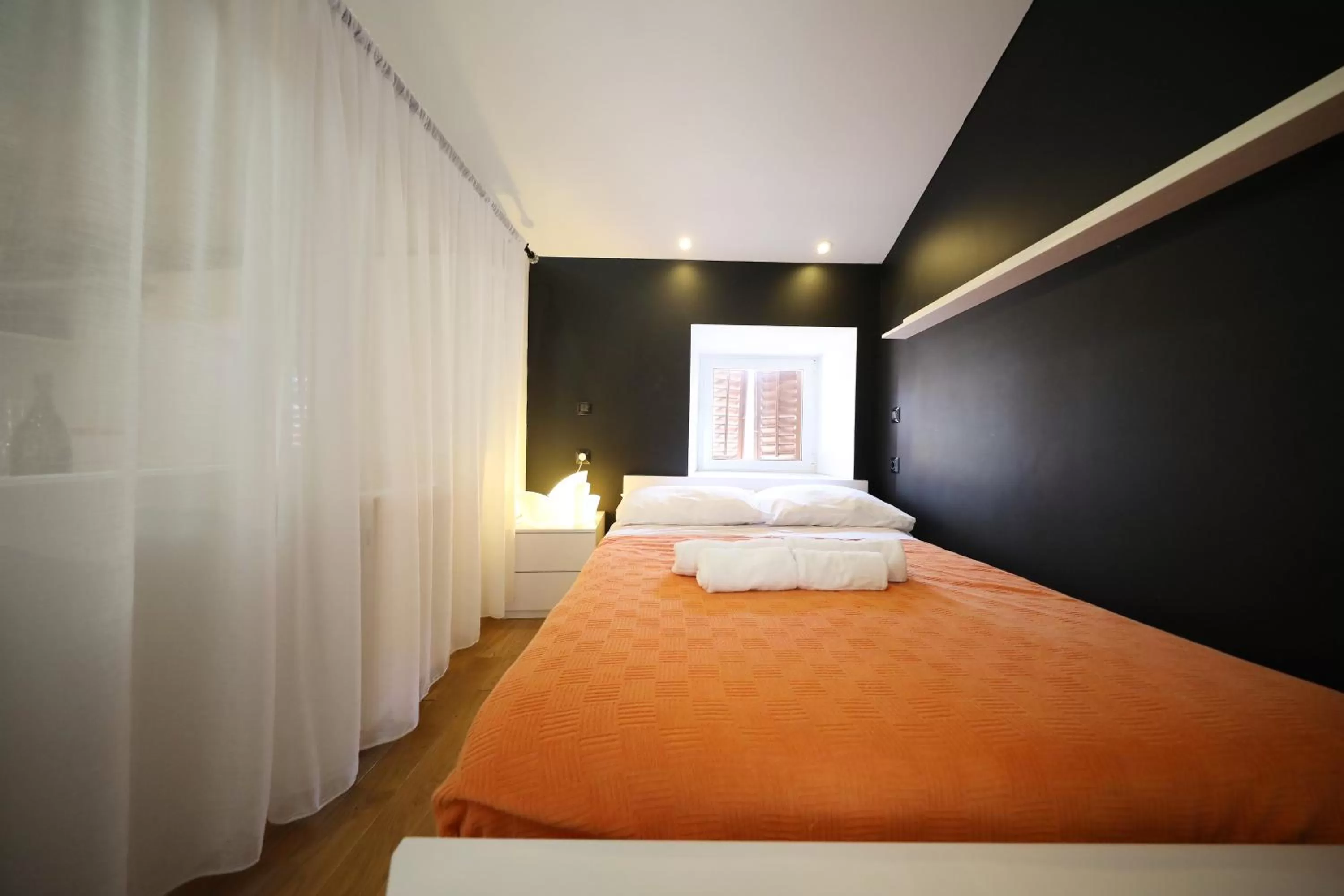 Bed in Central Apartments Integrated Hotel