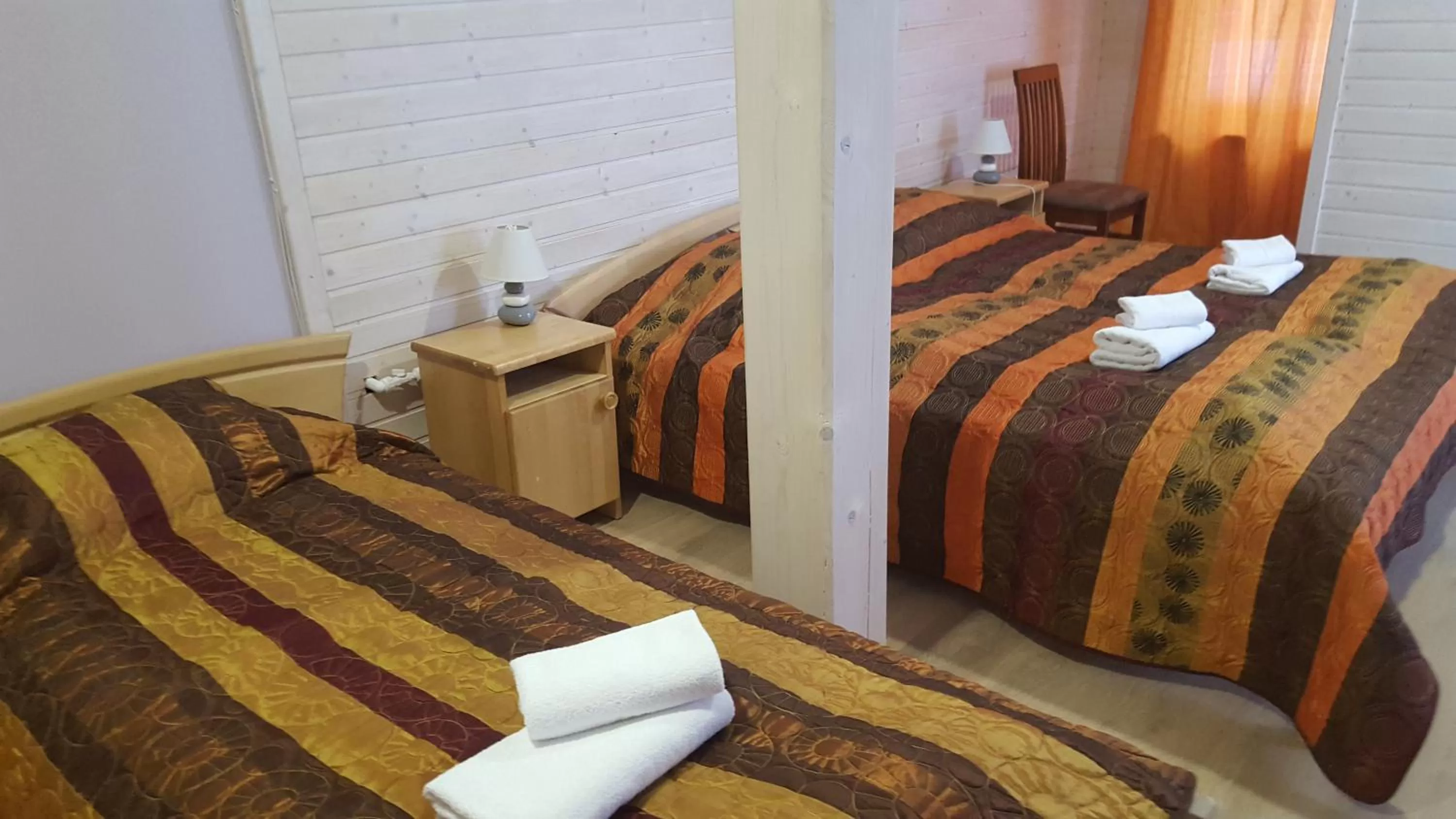 Photo of the whole room, Bed in Sunset Hotel