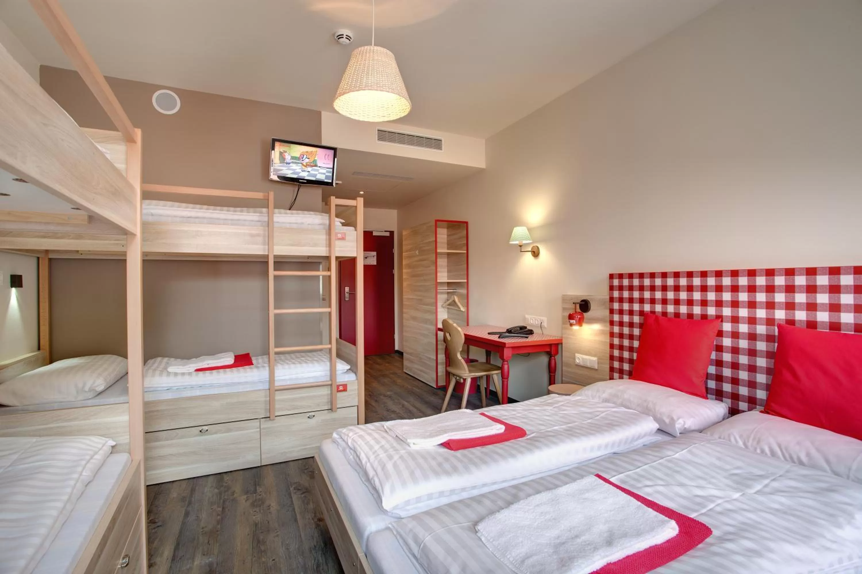 Photo of the whole room, Bed in MEININGER Hotel Salzburg City Center