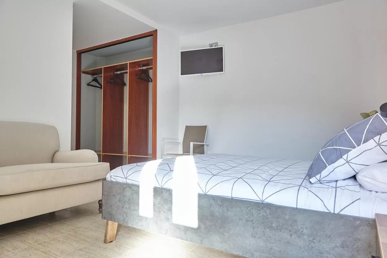 Bed in HOSTAL FONTAÑAN