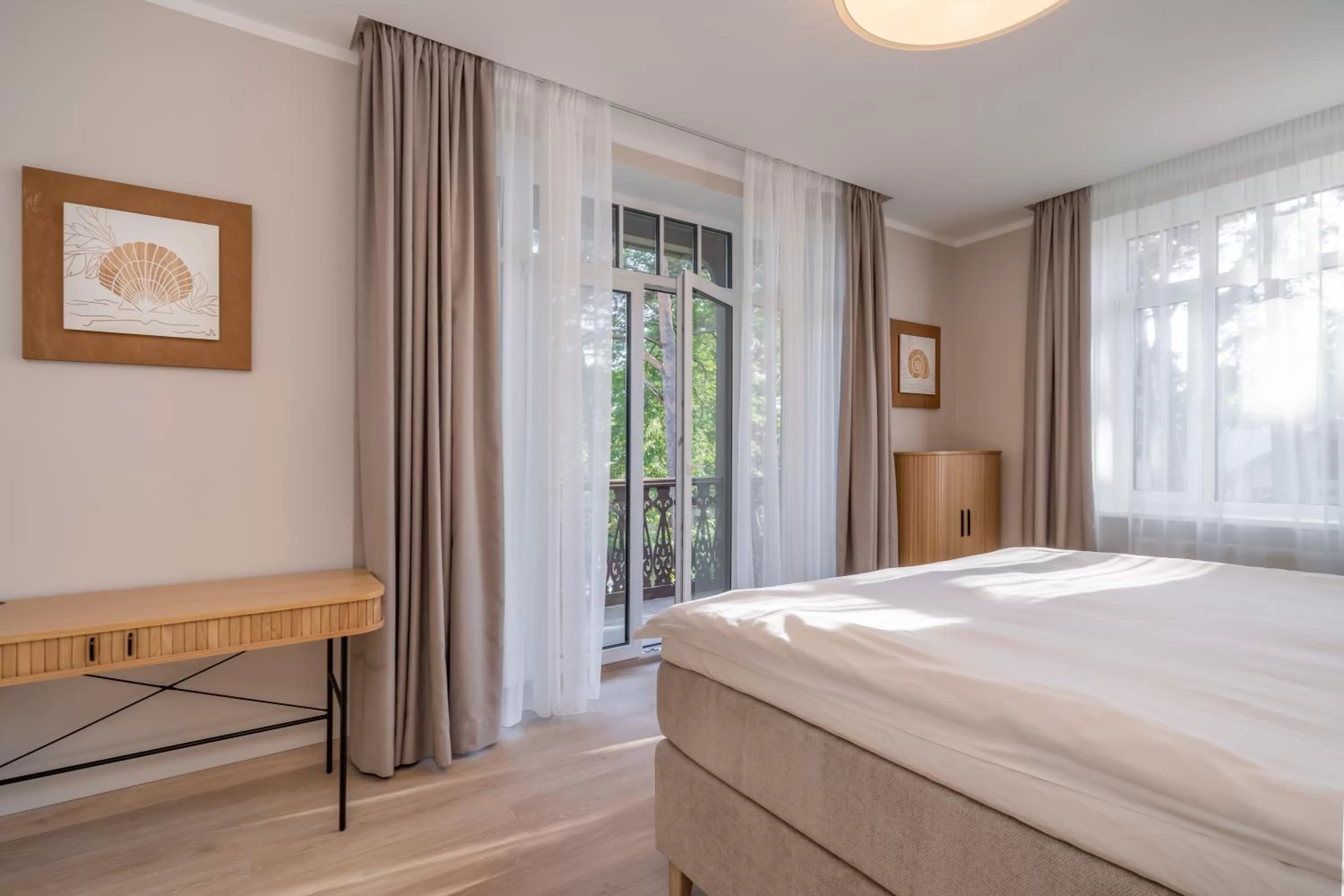 Bed in STORIES Design ApartHotel