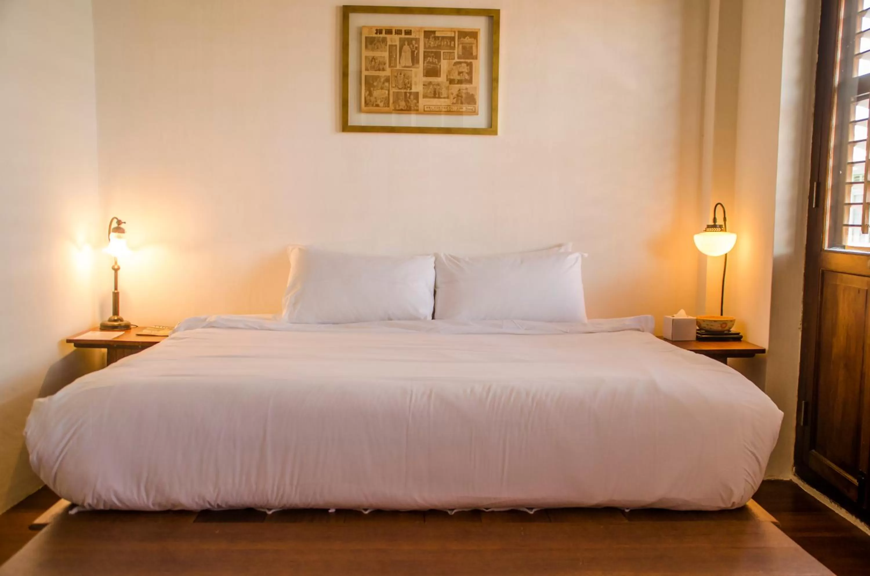 Bed in Ren I Tang Heritage Inn