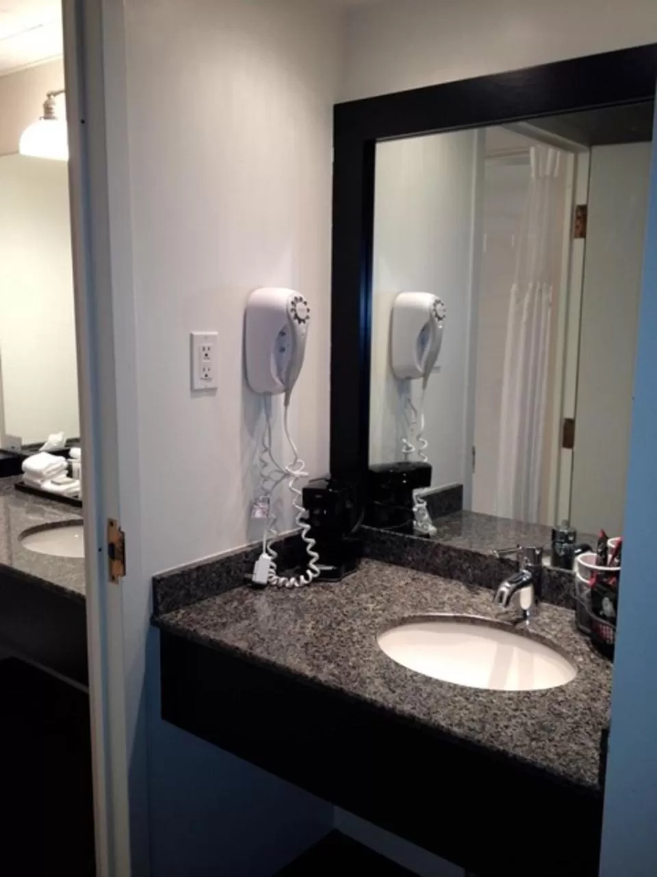 Bathroom in Travelodge Hotel by Wyndham Kingston Lasalle