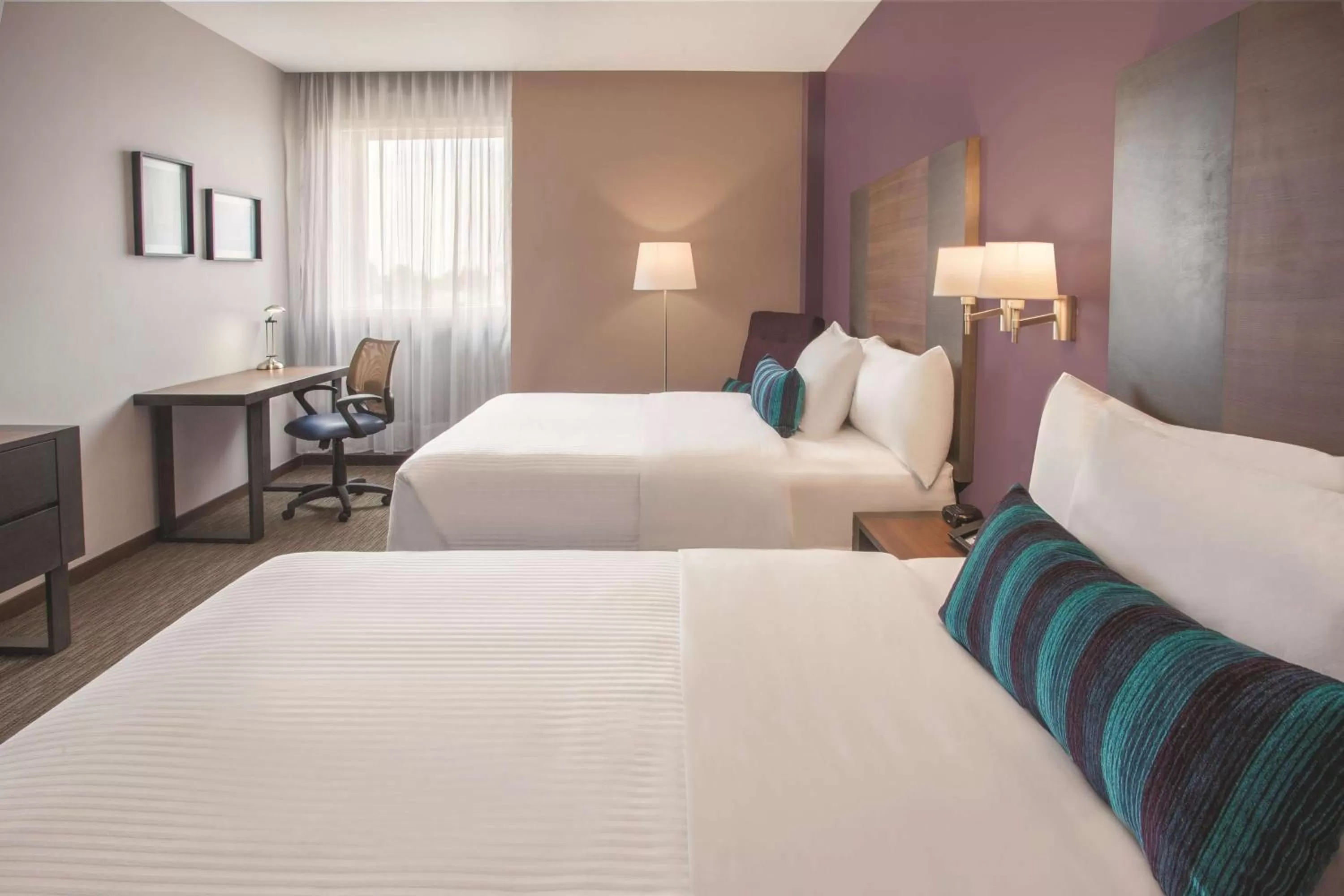 Photo of the whole room, Bed in La Quinta by Wyndham Aguascalientes