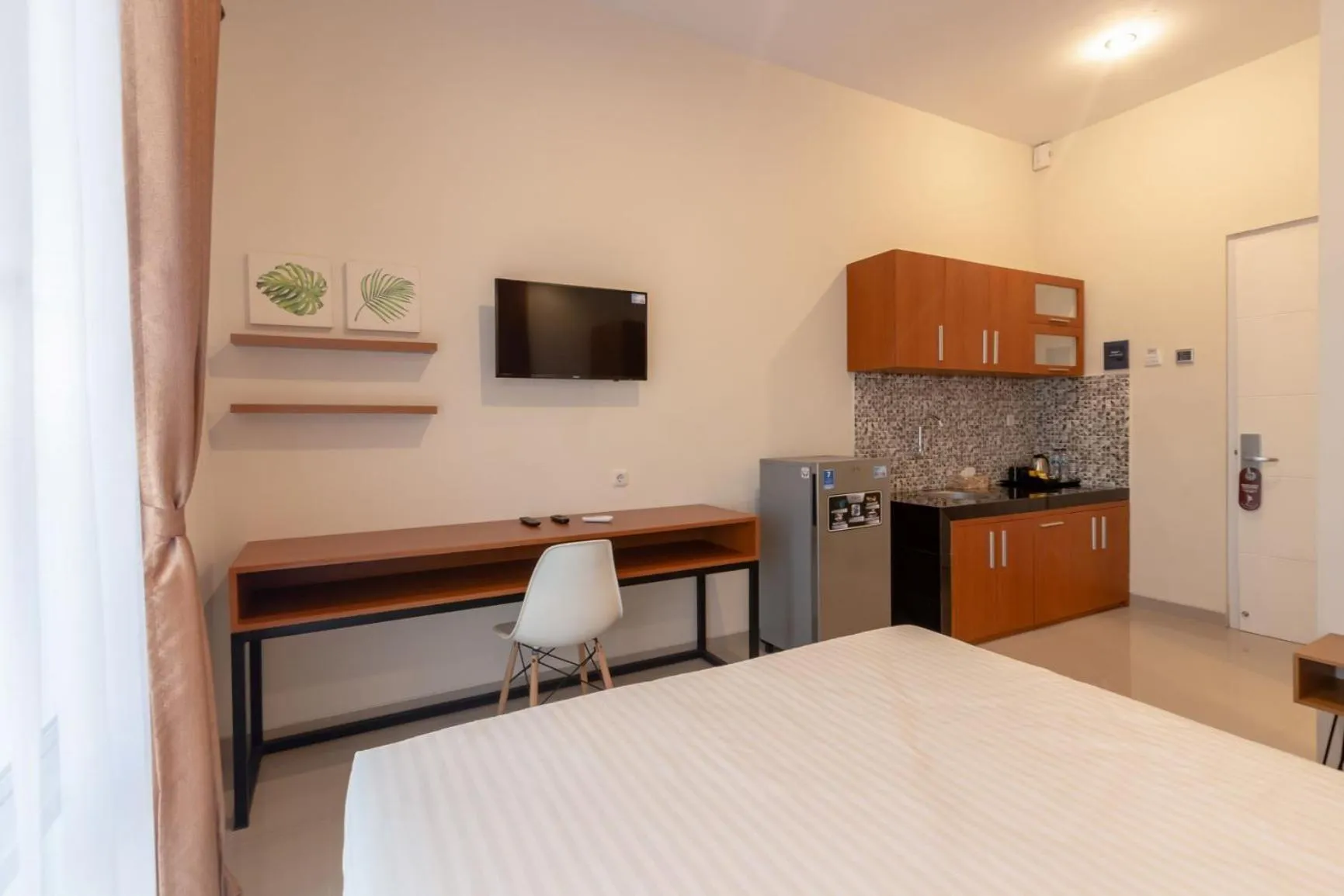 Photo of the whole room, Bed in Omah Manis