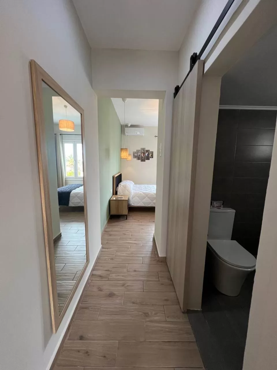 Bed in Elefsinian Mysteries Apartments